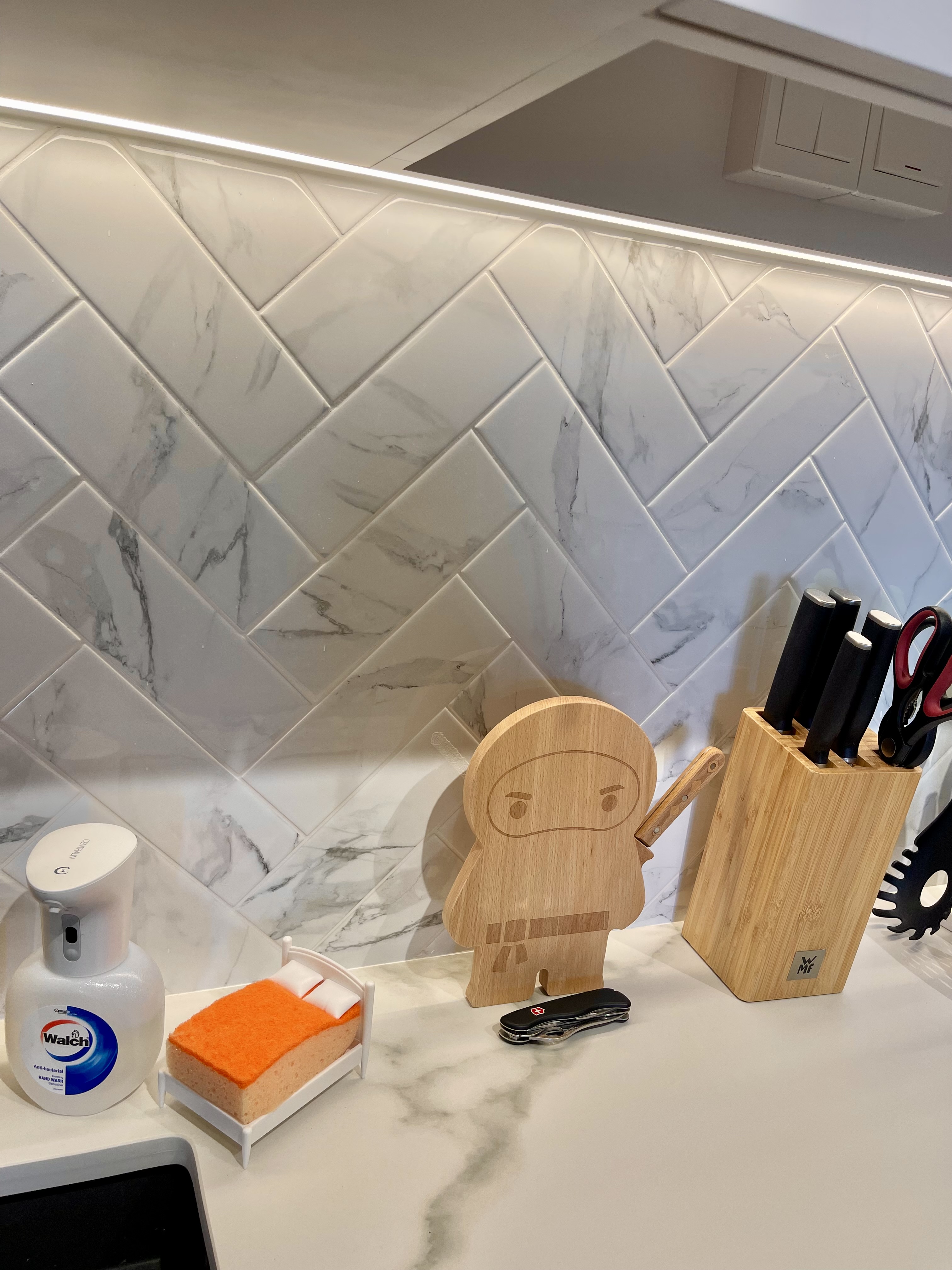 Our Kitchen: A Fusion of Muji Concept & European Shaker-Style Cabinets - White marble tiles, kitchen countertop, modern