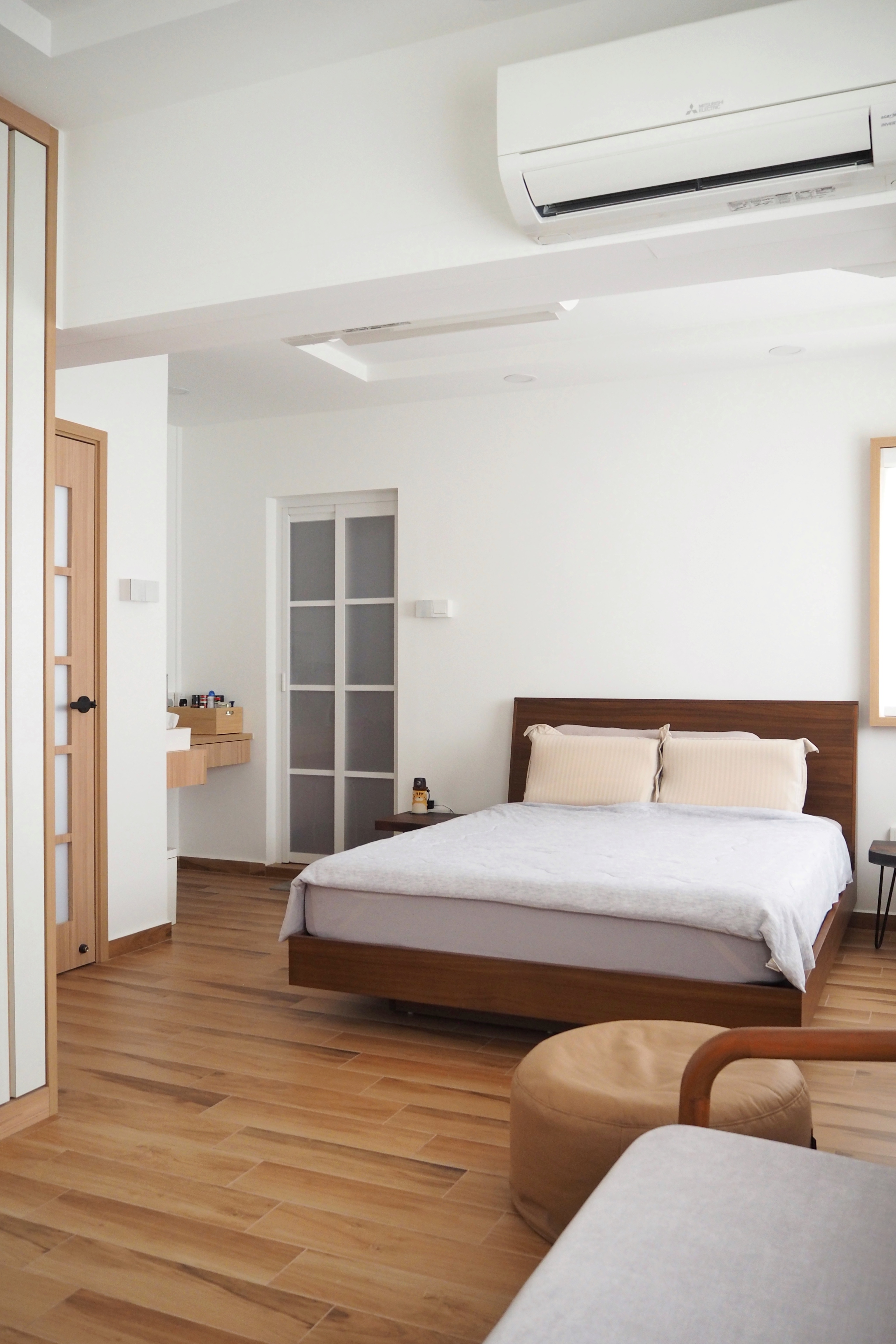 Inspiration from a Staycation: A Lounge Area in Our Bedroom - Wooden floor, white walls, modern design, minimalist furniture