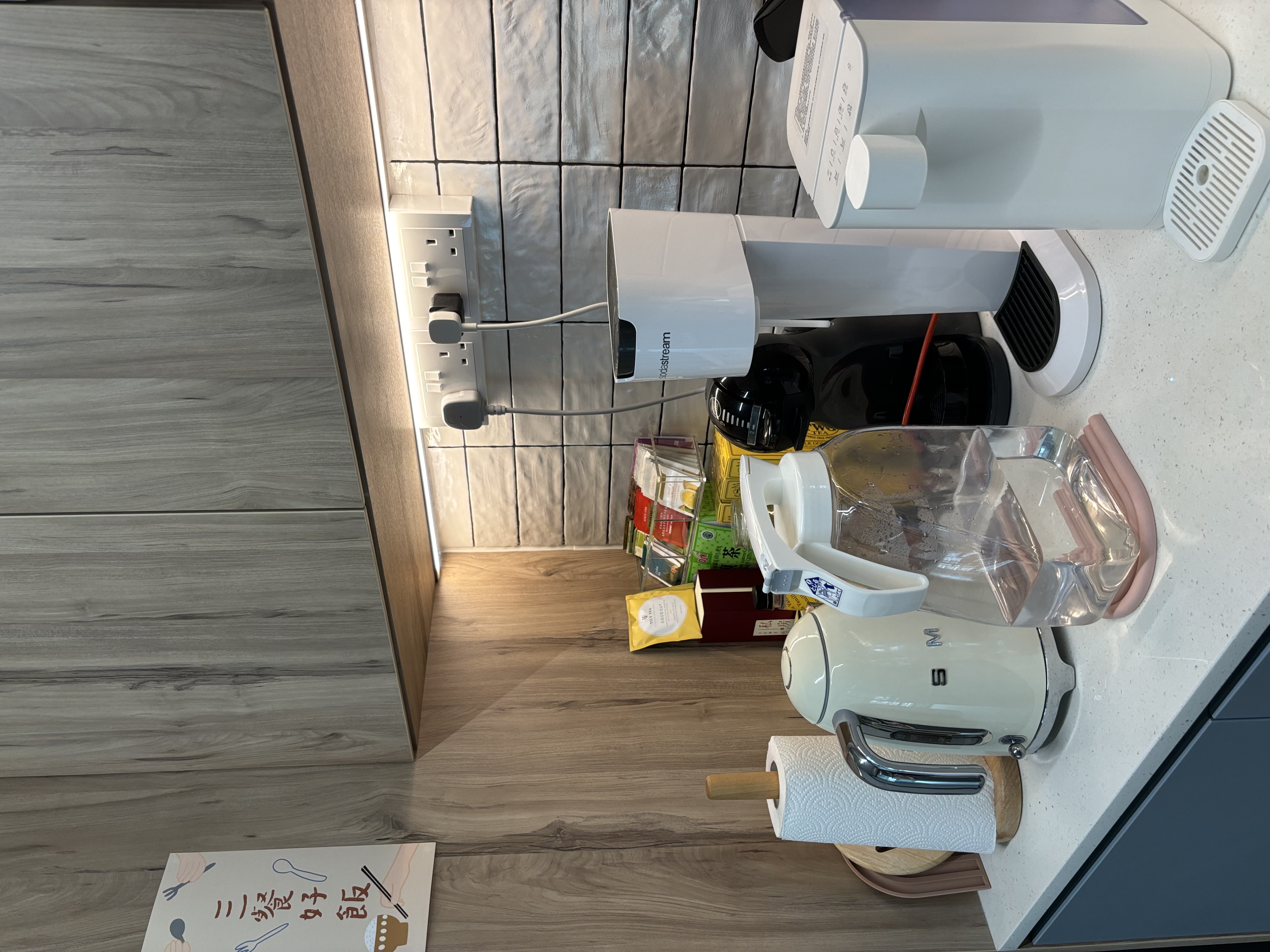 Our Food Playground with Subway Tiles and Pop of Colour - Wooden floor, kitchen countertop, modern appliances, white kitchen