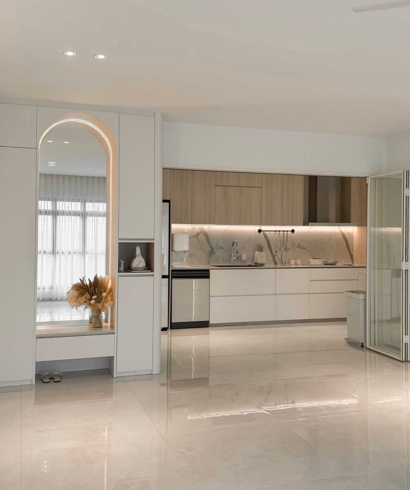 Kitchen: Open (& closed), matching appliances & concealed bomb shelter - Modern kitchen with sleek white cabinets and marble