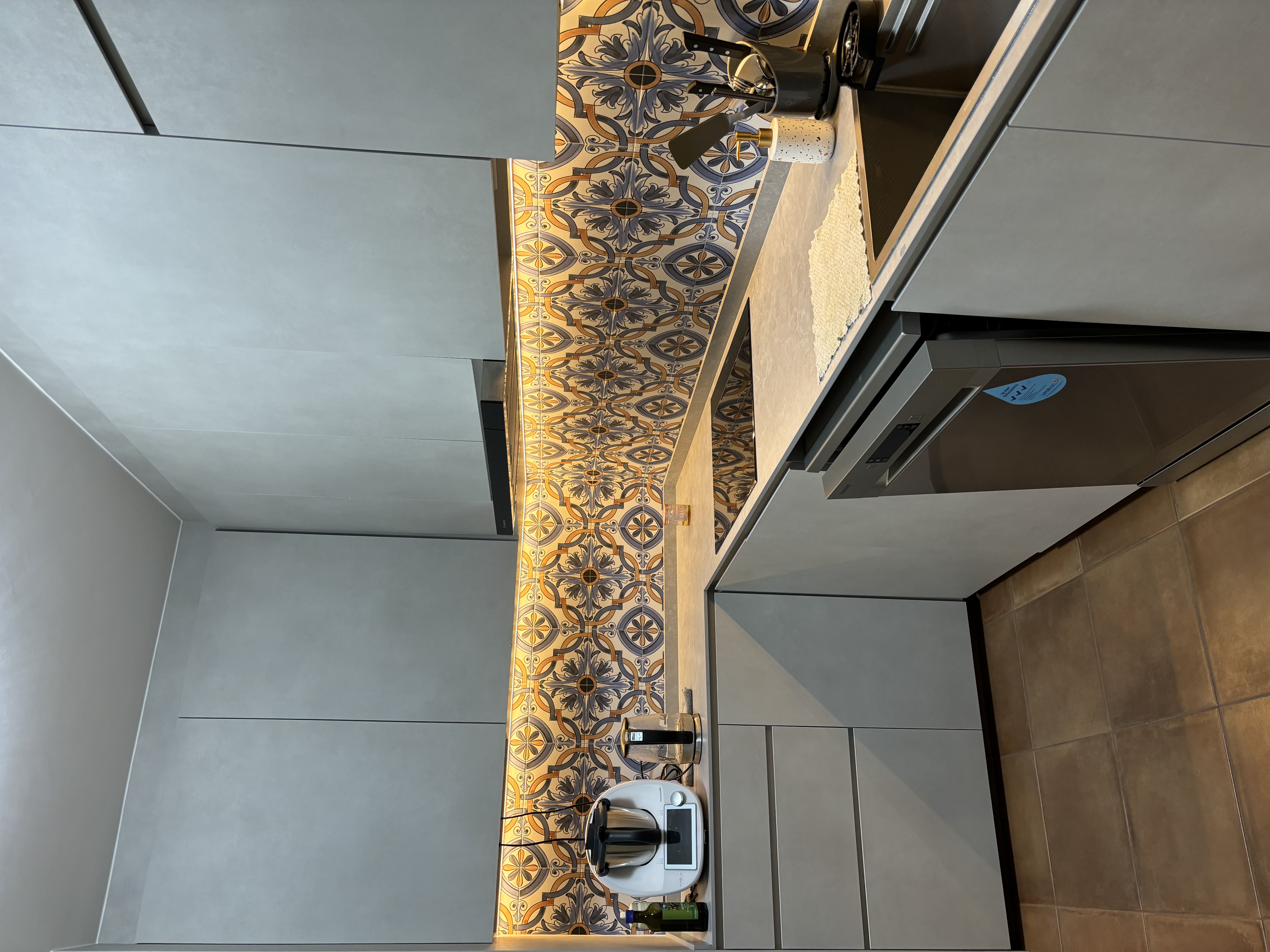 Small tiles for backsplash?! Inside a modern Spanish style kitchen - Modern kitchen with contemporary design, sleek