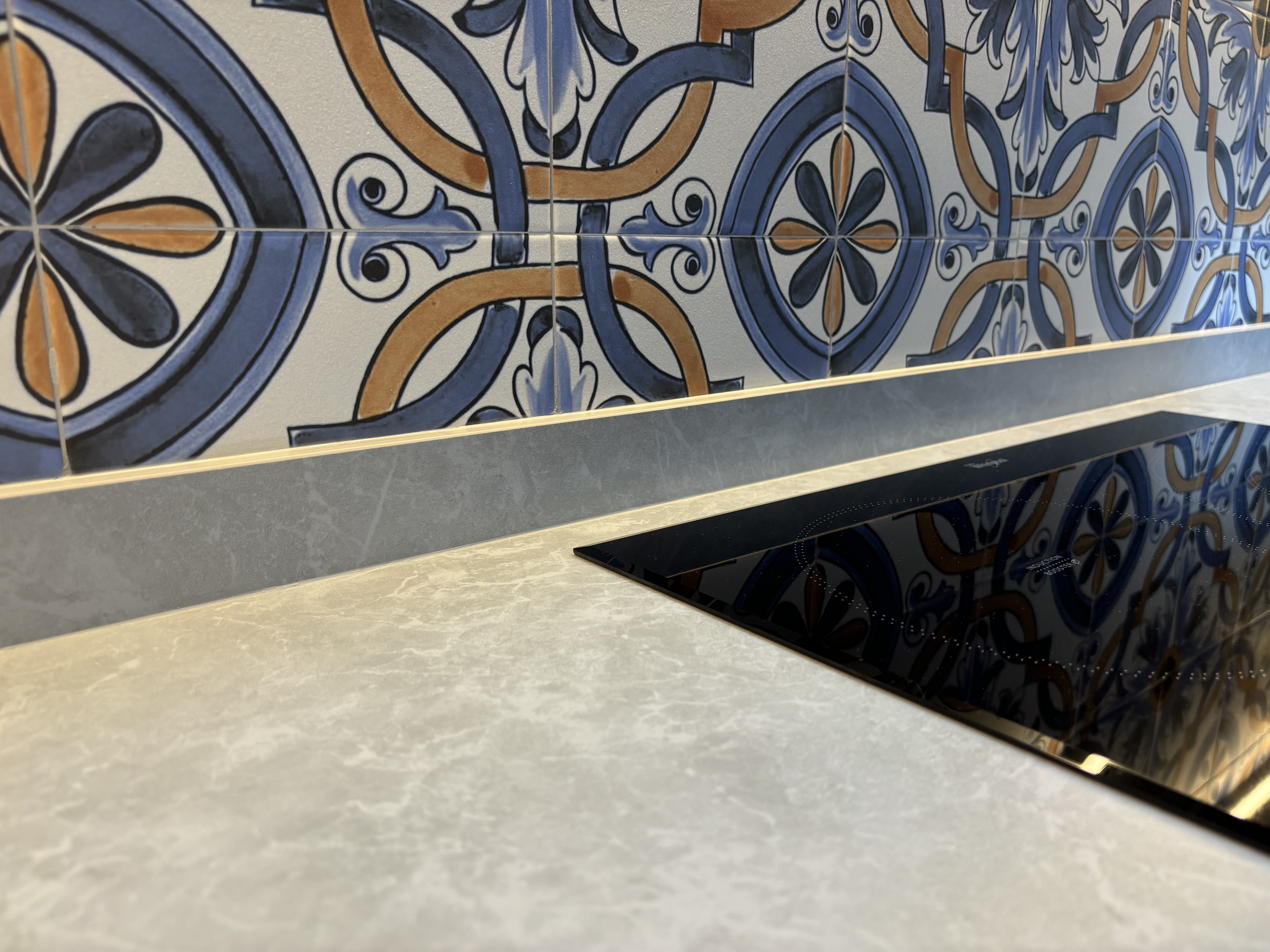 Small tiles for backsplash?! Inside a modern Spanish style kitchen - Ornate tile pattern with intricate designs, Black