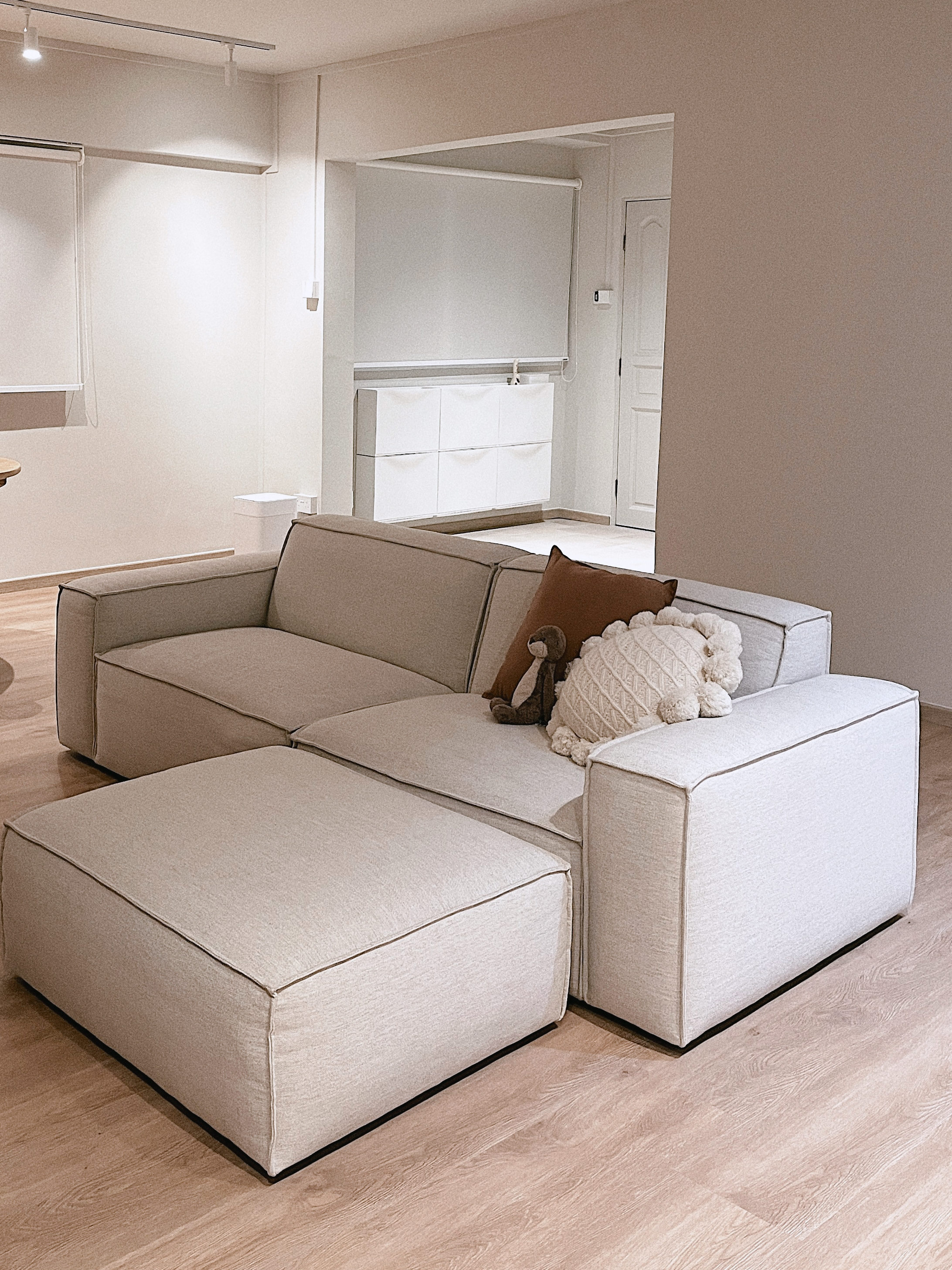 Turn Your House into a Home with These Personal Favorites - Modern minimalist living room, beige sectional sofa, cozy seating