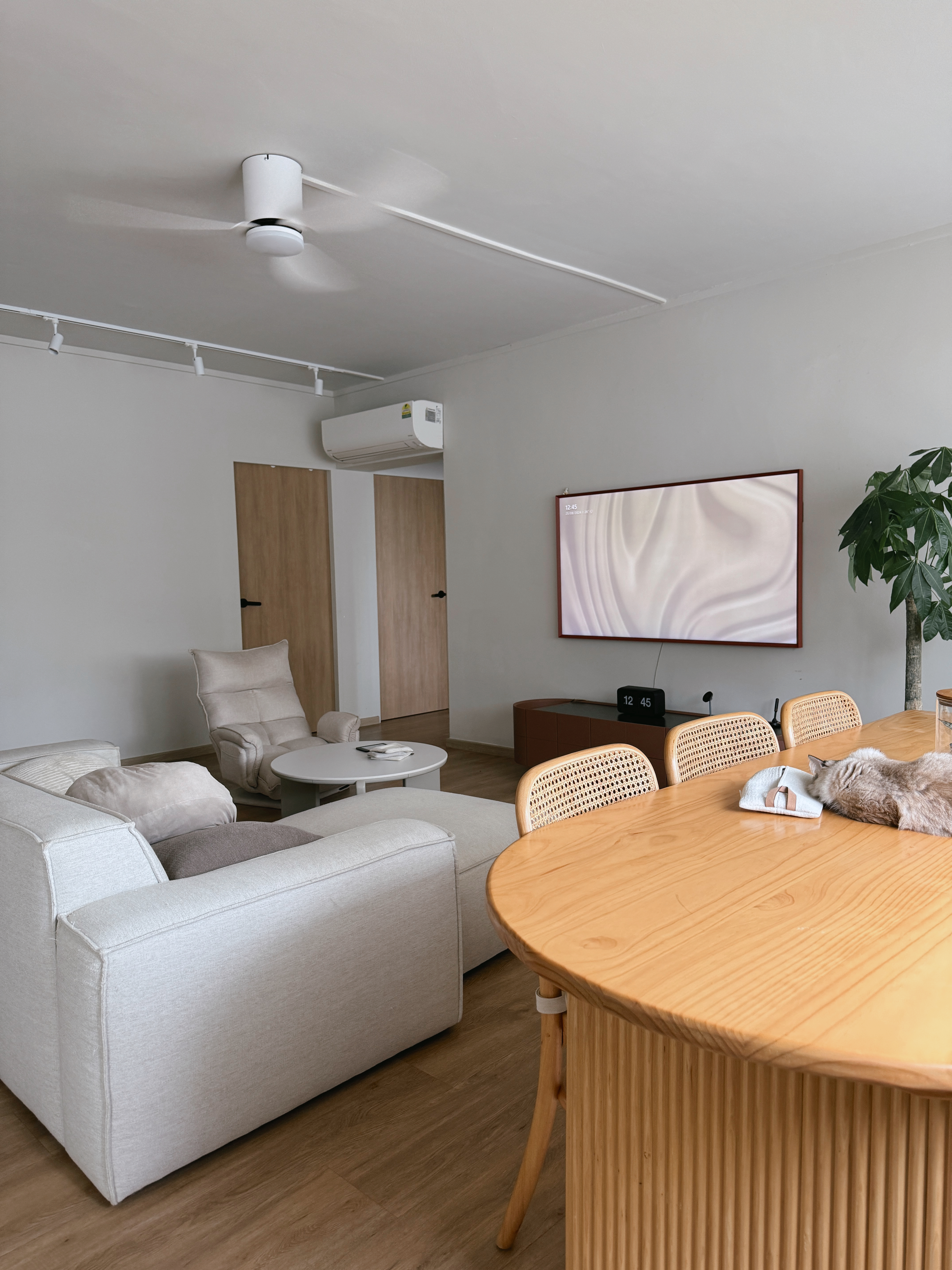 Turn Your House into a Home with These Personal Favorites - Modern minimalist living room, neutral color palette, large