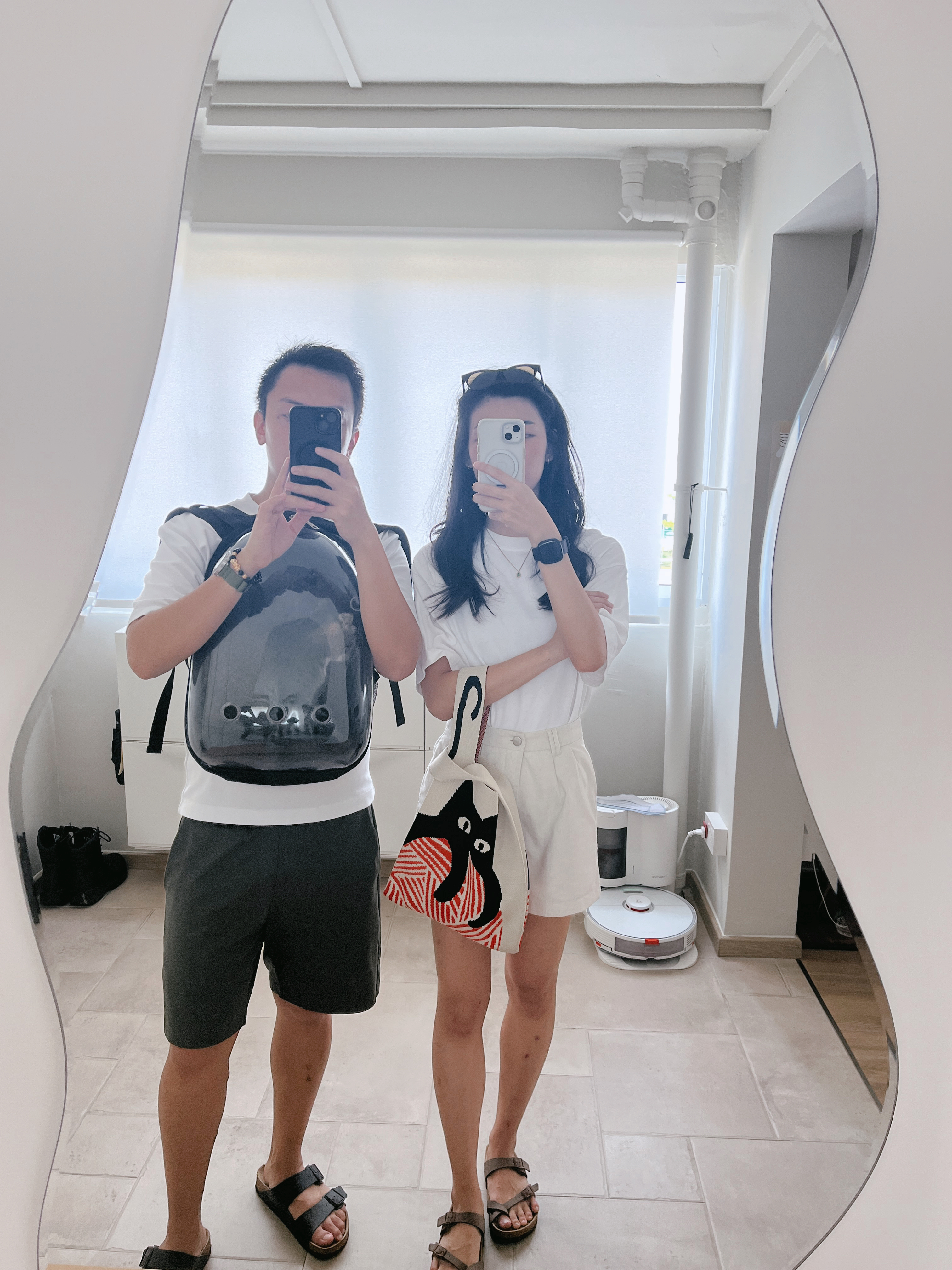 Turn Your House into a Home with These Personal Favorites - White room, mirror reflection, man and woman, taking selfie