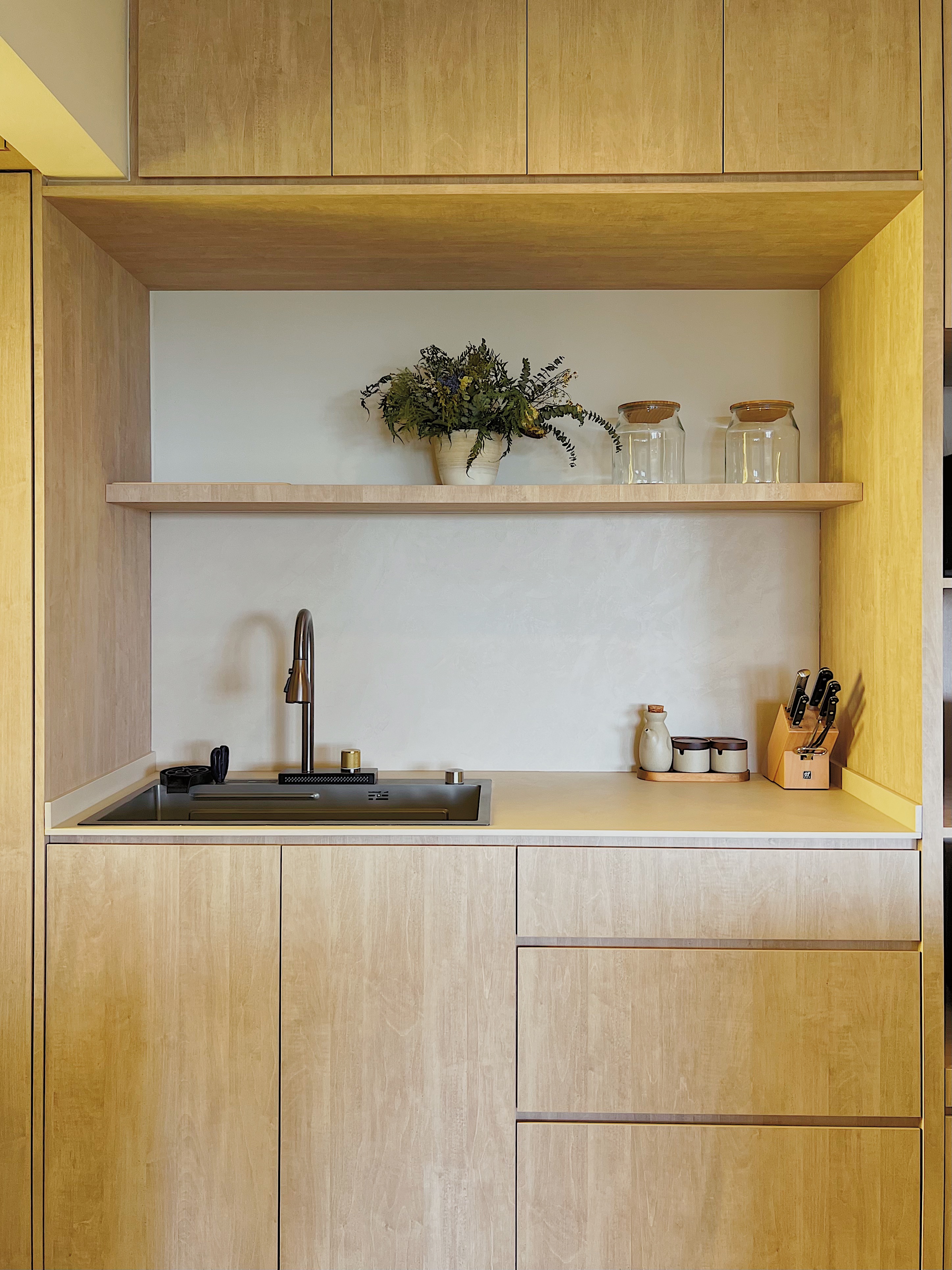 Whipping Up Meals on our Peninsula Stove - Wooden kitchen cabinets, minimalist design, modern kitchen, sleek sink, stainless