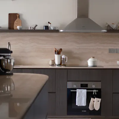 Customer home photo 17: Our Travertine & Dark Oak Kitchen: Open-Concept with Ample Countertop