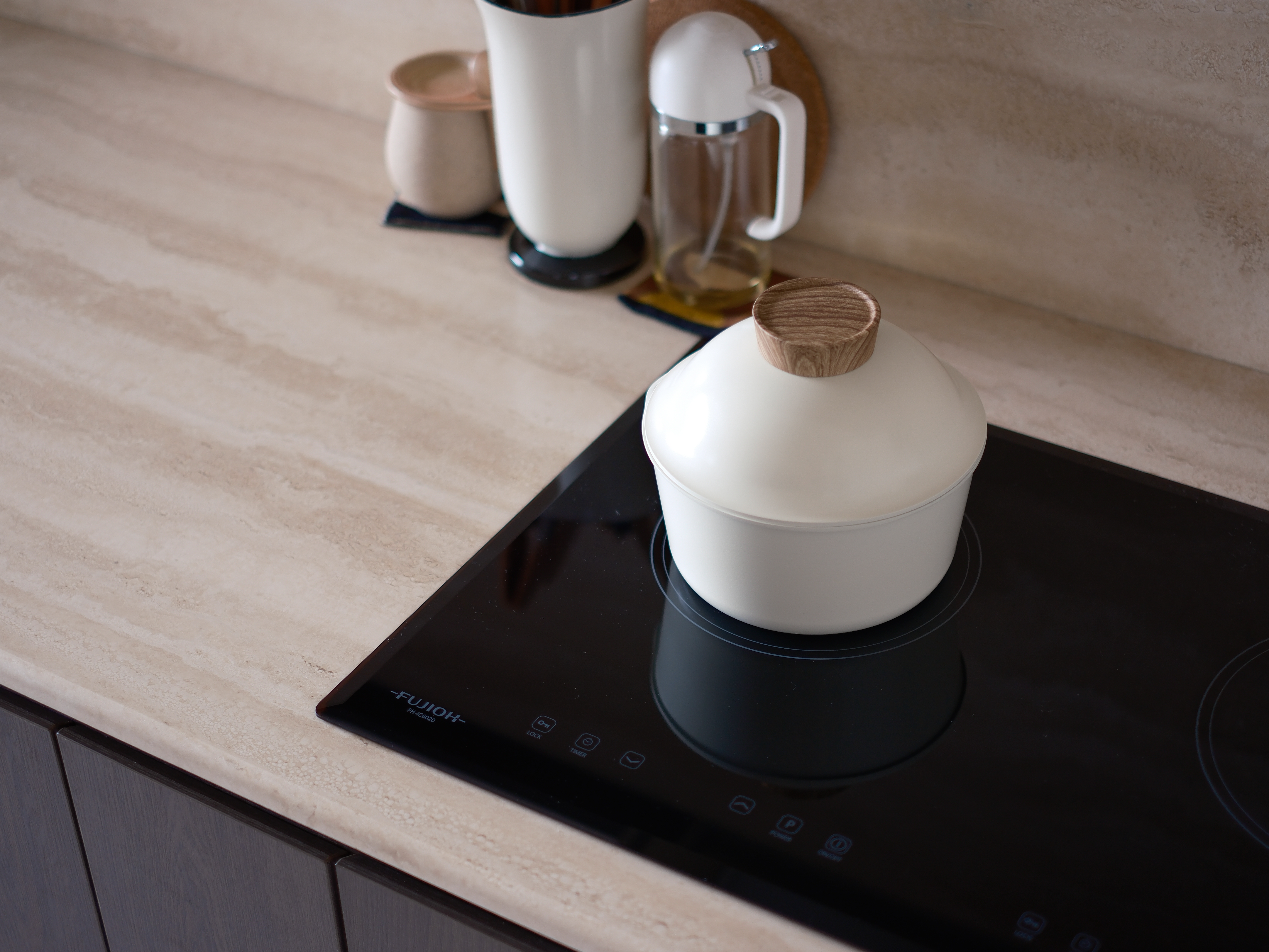 Our Travertine & Dark Oak Kitchen: Open-Concept with Ample Countertop - White electric stove, modern kitchen countertop