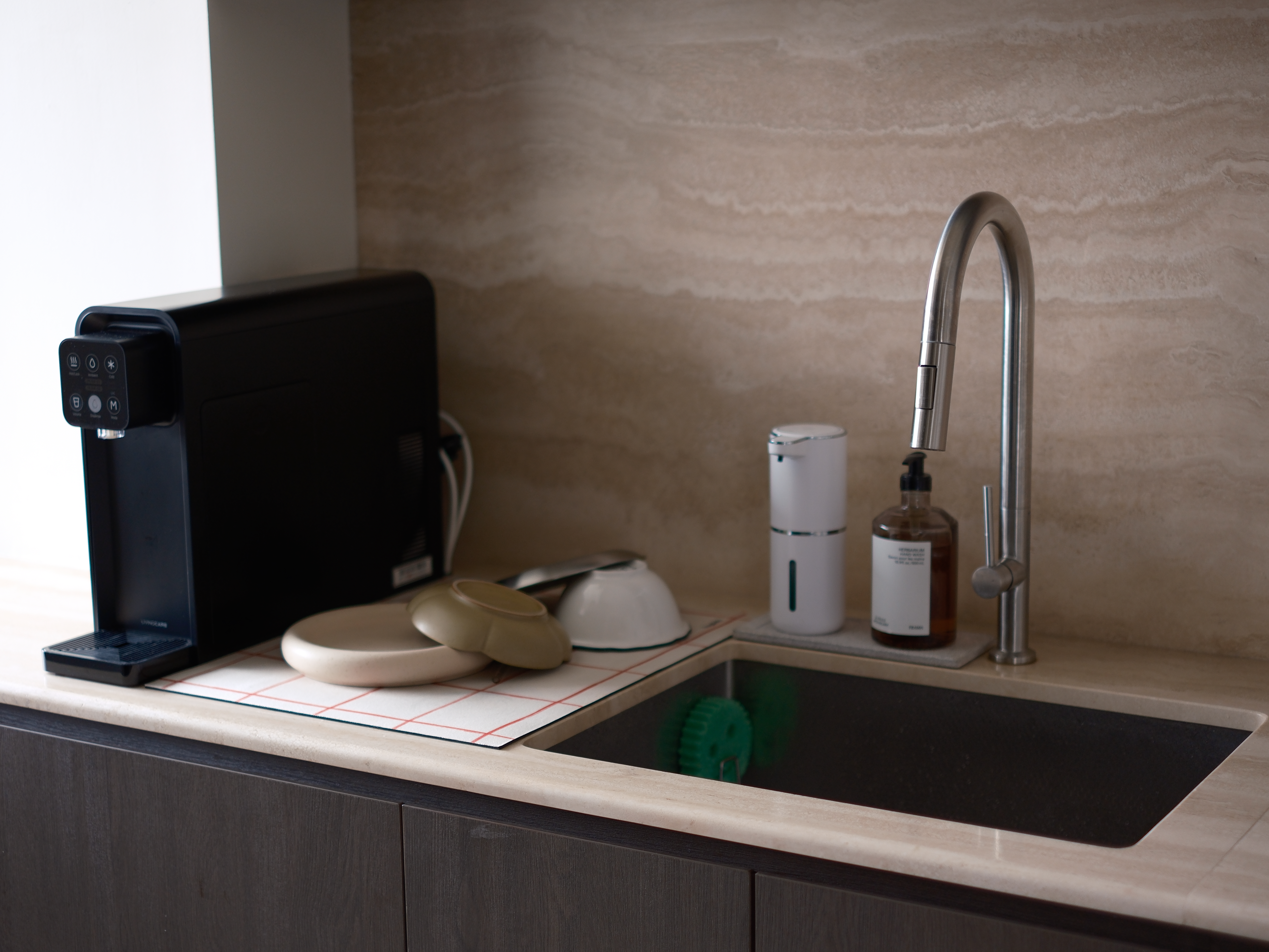 Our Travertine & Dark Oak Kitchen: Open-Concept with Ample Countertop - coffee maker, kitchen sink, modern kitchen