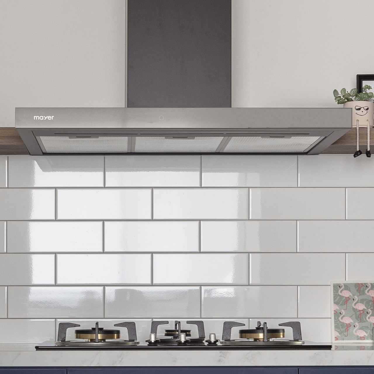 Renovation regrets: things we could have chosen for easier upkeeping! - Mayer range hood, white tiled backsplash, modern