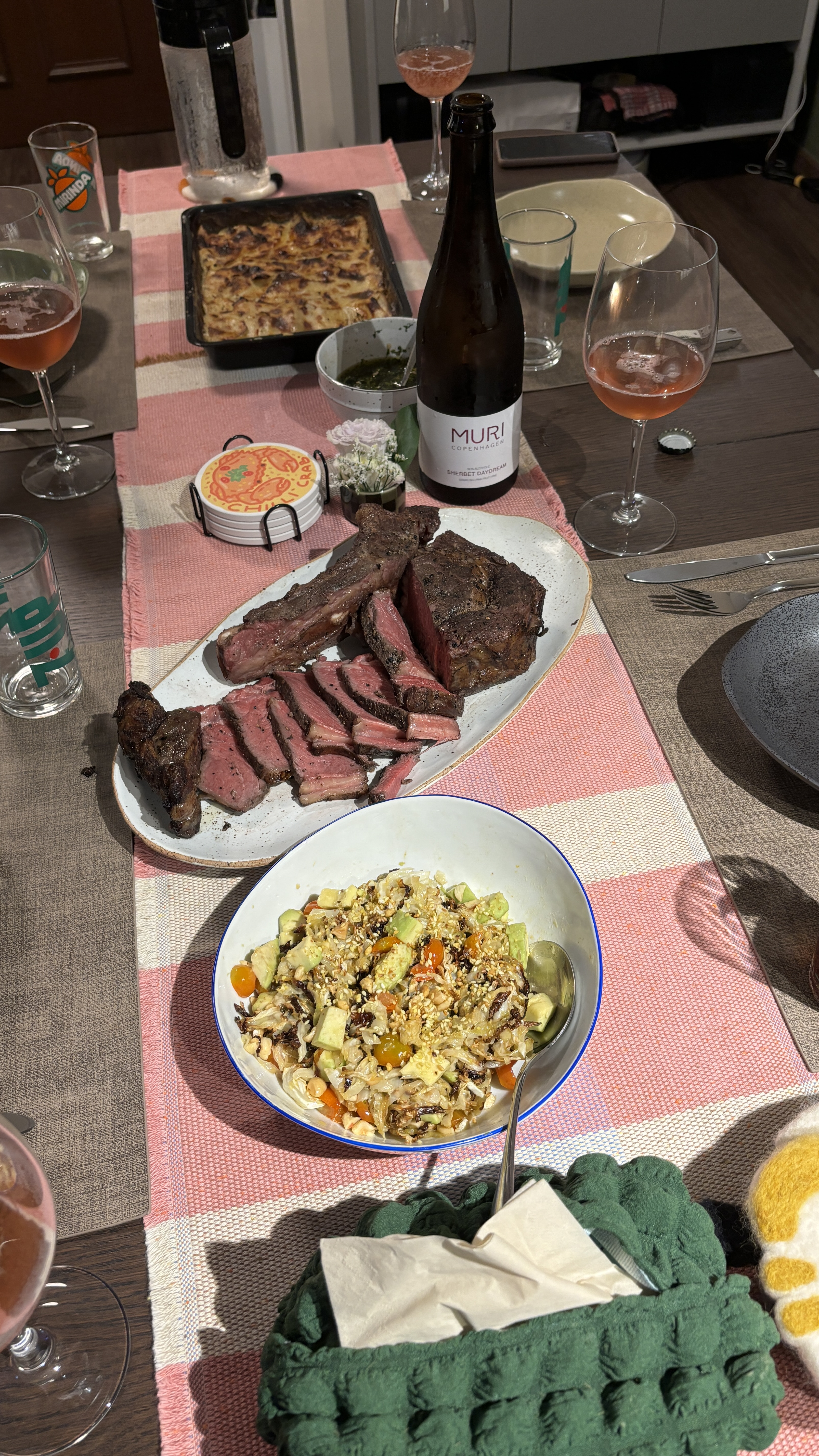 Hosting tips for Weekday Dinner Parties - Grilled steak, salmon, salad, beer, wine, glass, table setting, meal, food items