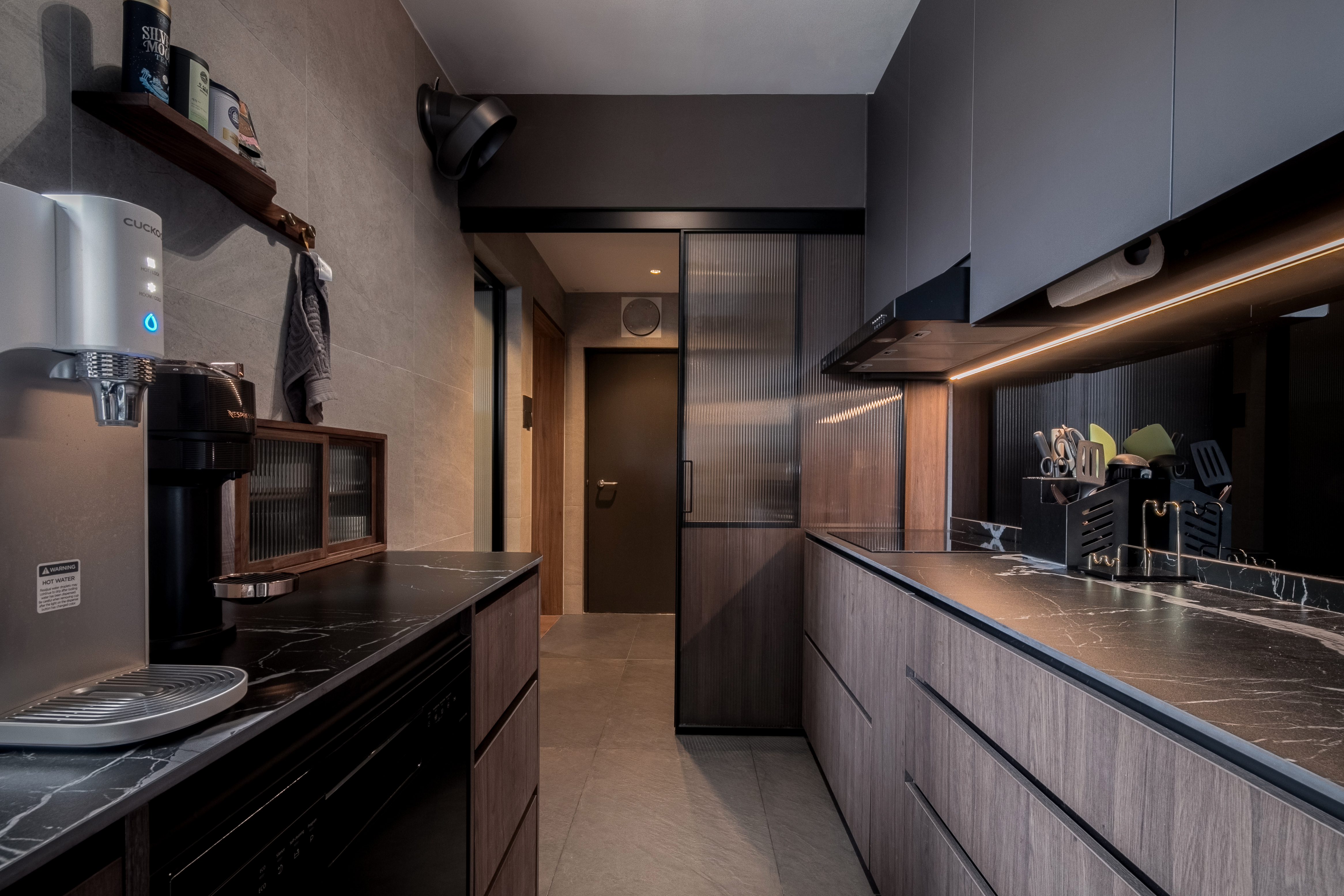 Warm and Cozy Kitchen: A Daily Ritual of Comfort - modern kitchen, sleek design, dark wood cabinets, black countertops