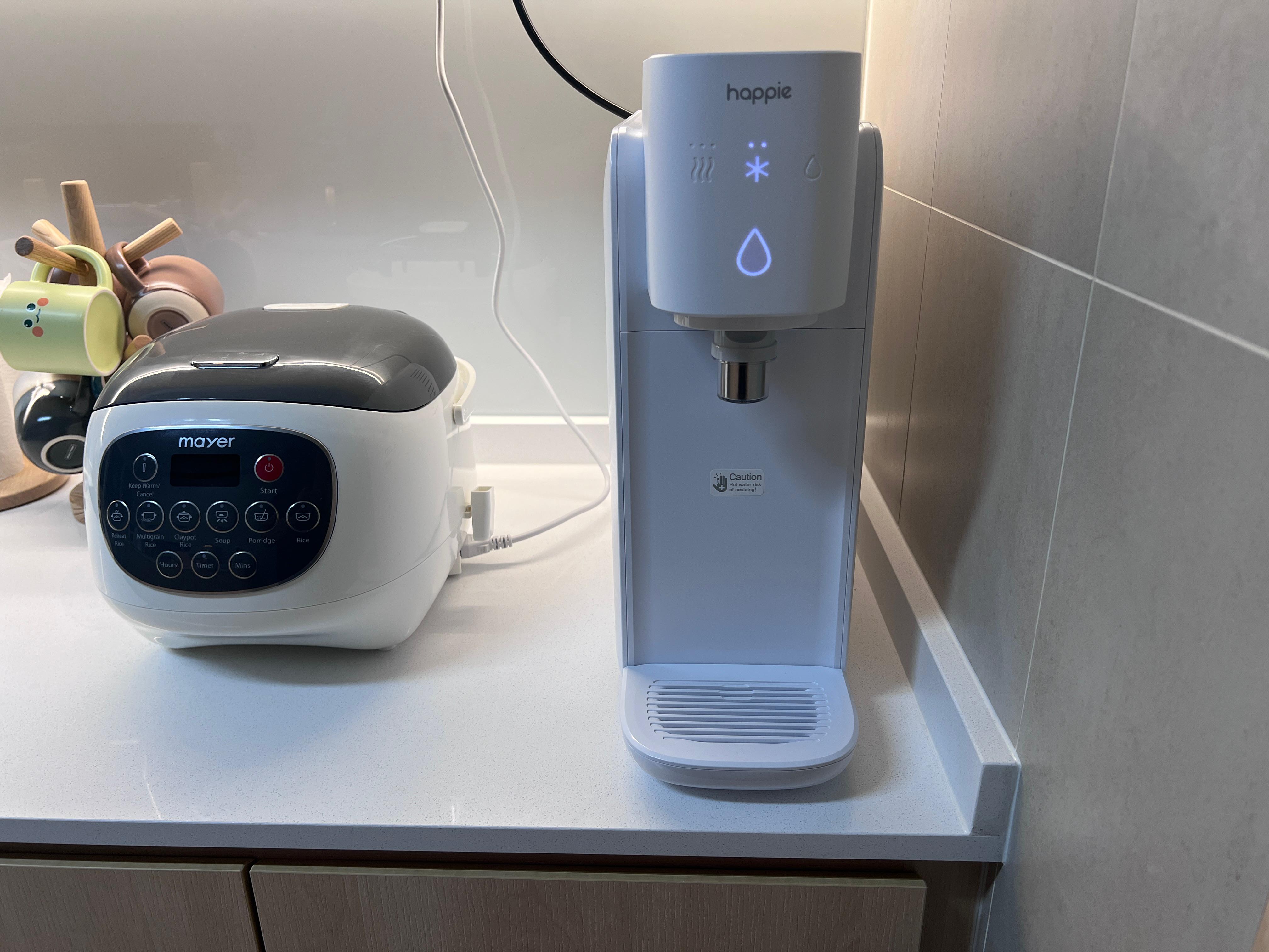 Into our minimalist kitchen - Water dispenser, kitchen counter, modern design, smart water feature, automatic water release