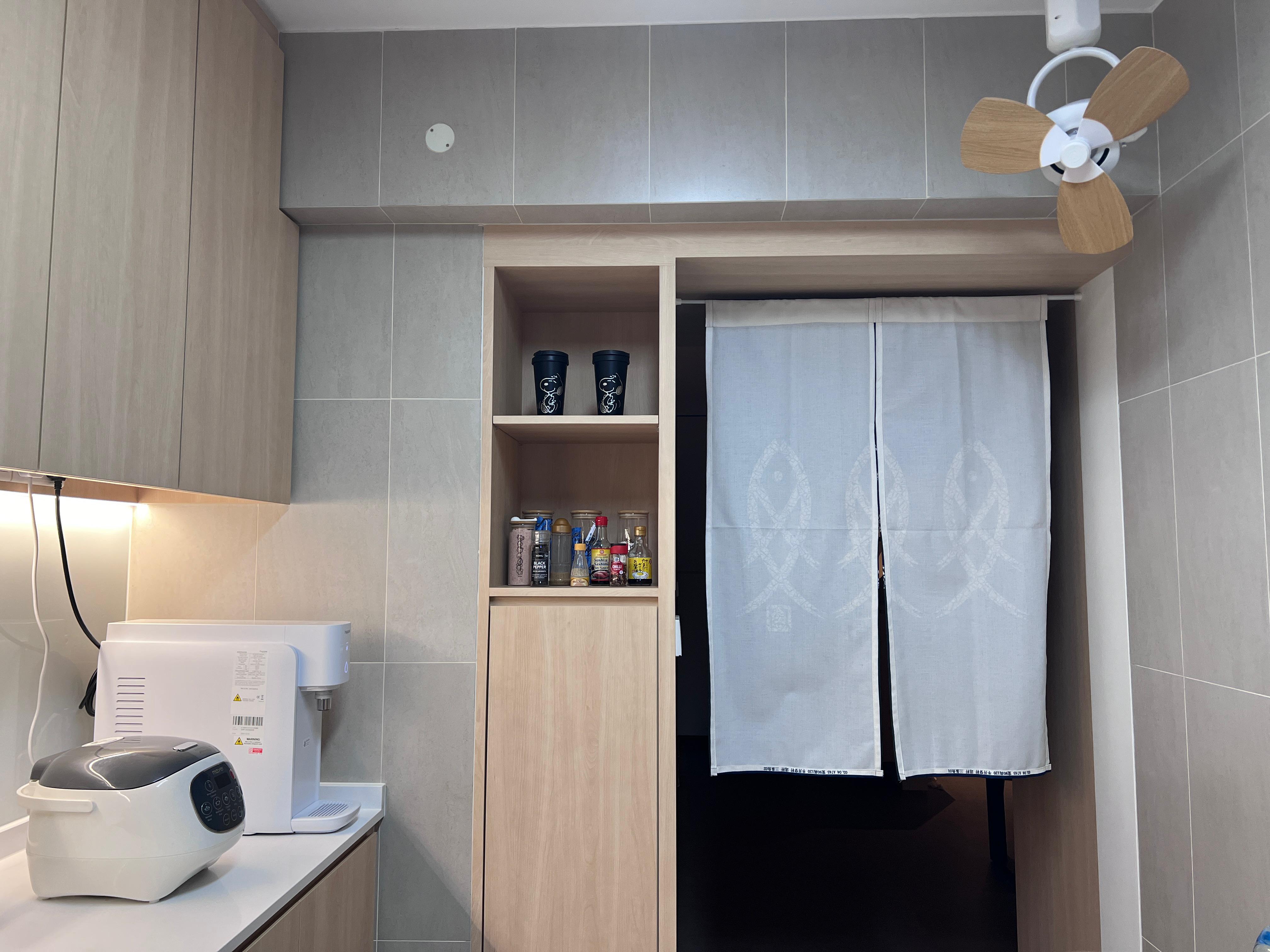 Into our minimalist kitchen - microwave, kitchen cabinet, countertop, coffee maker, wooden cabinets, light fixture, ceiling