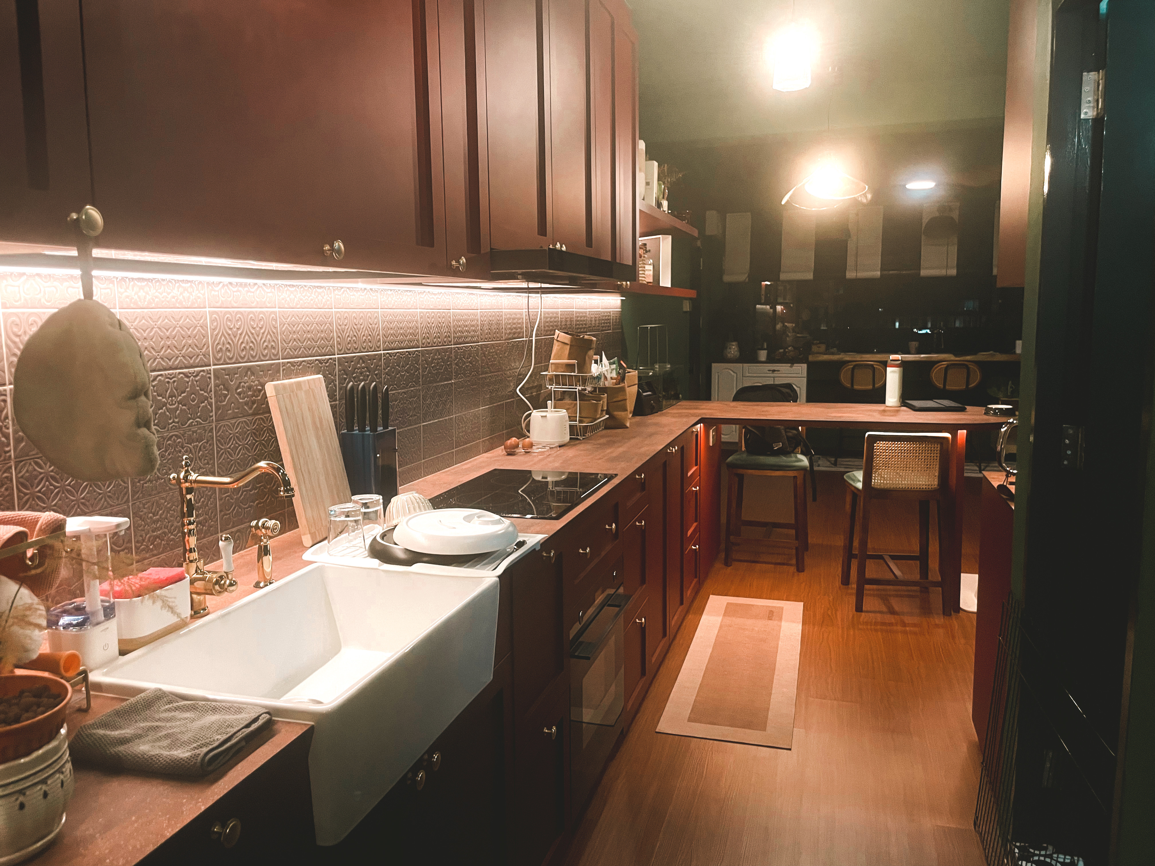 Bold and Unique: Our Open Kitchen with an Unconventional Color Palette - Kitchen countertop, wooden cabinets, sink, faucet