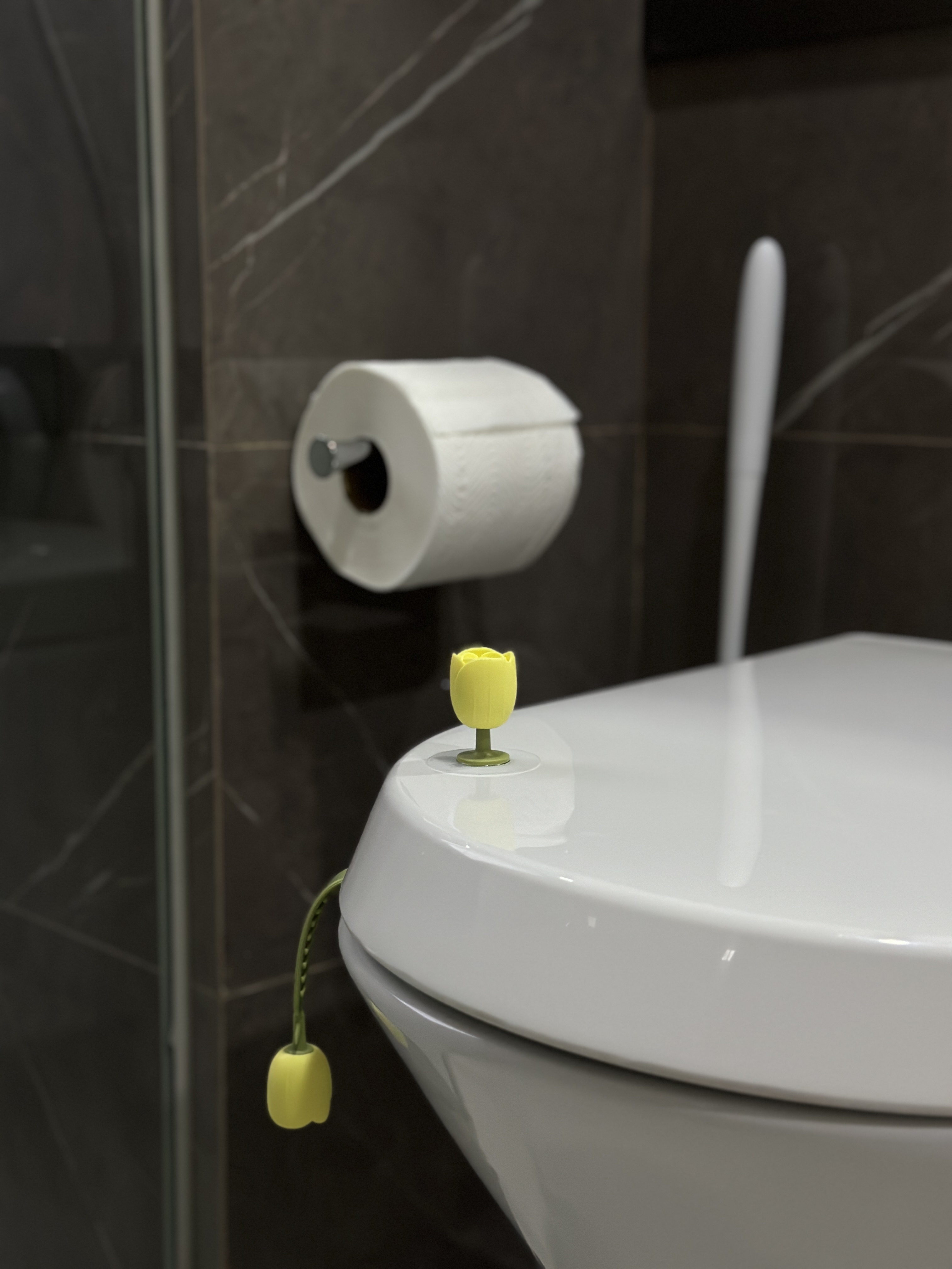 Minimalist Bathroom with a touch of mindfulness 🌿 - White toilet bowl, modern bathroom, sleek design, yellow toilet paper