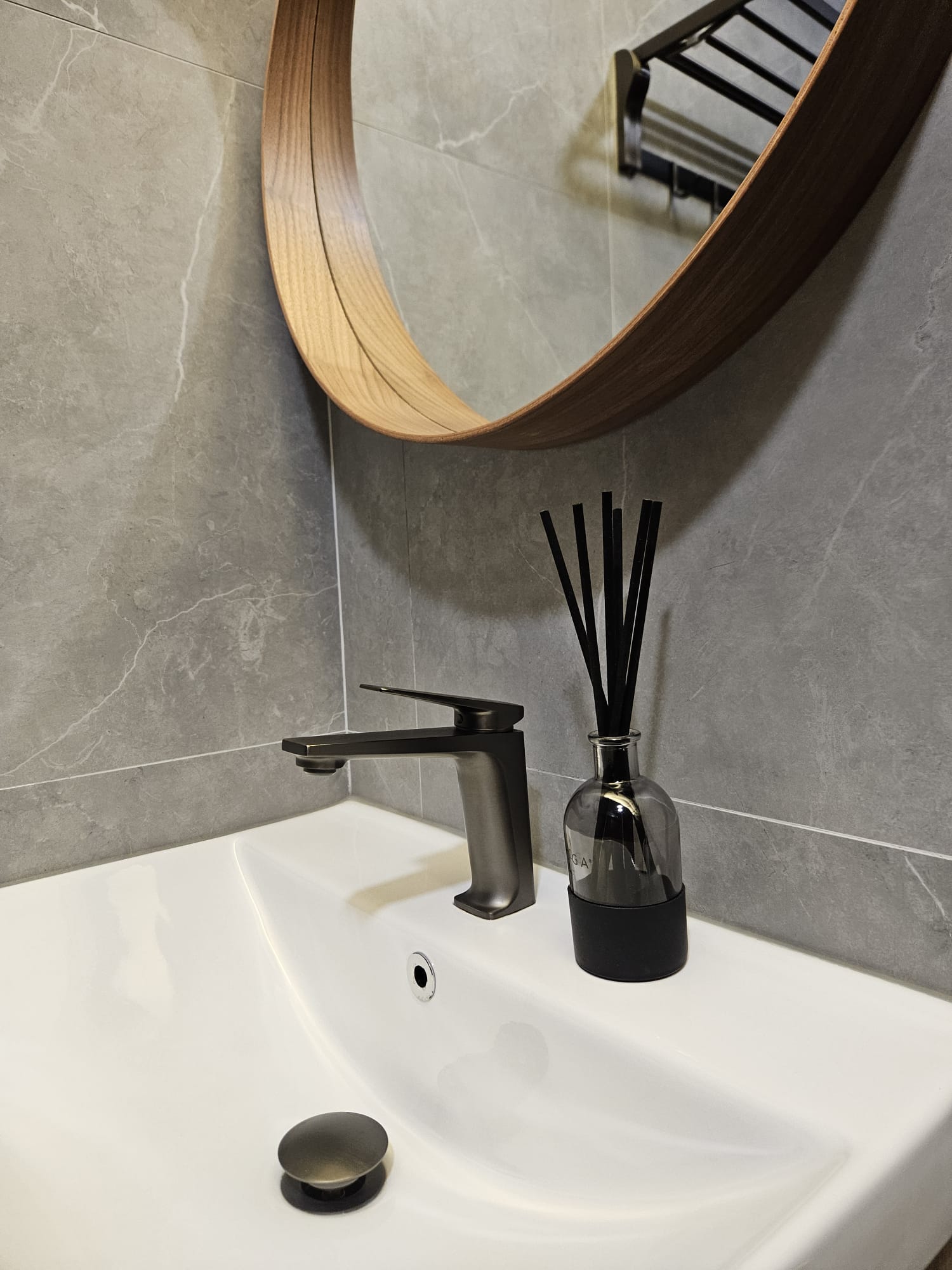 Keeping our Master Vanity Untouched - Modern bathroom vanity, sleek sink, white porcelain, minimalist design, round mirror