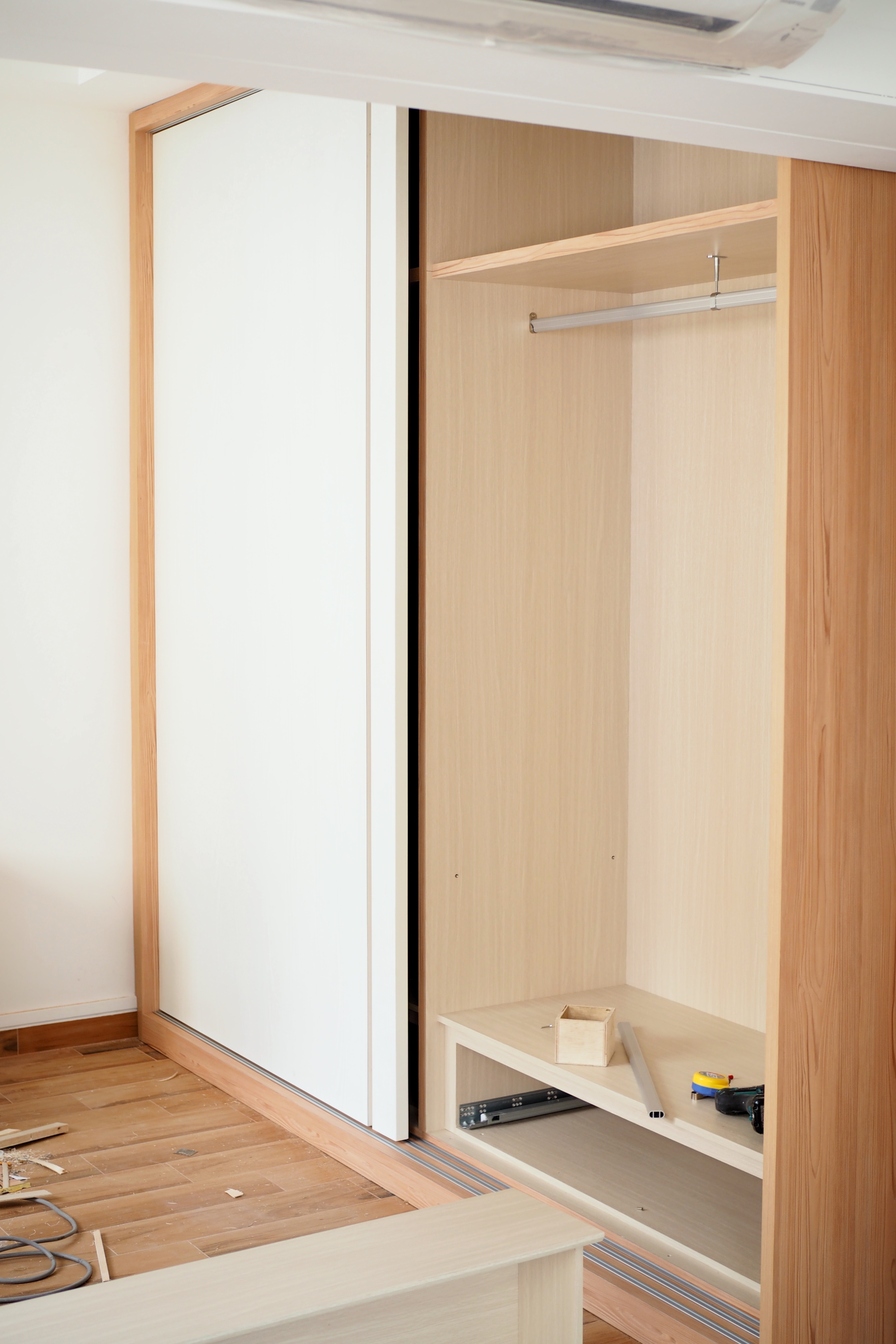 Our top renovation decision to tackle dust and clutter - Wooden cabinet doors, light wooden frame, white interior, wooden