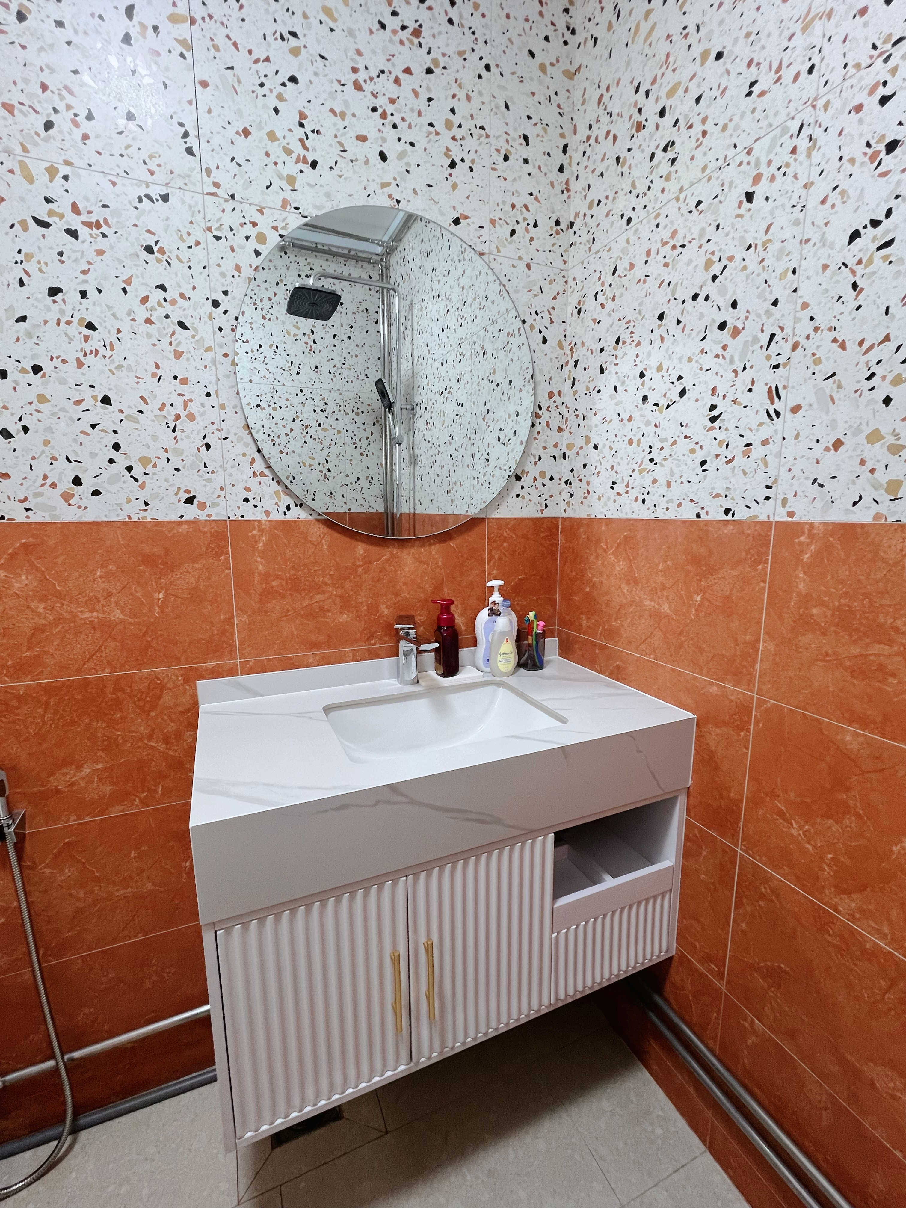 Tile Surprise: A perfect match found! - Modern bathroom vanity, white marble countertop, built-in sink, round mirror