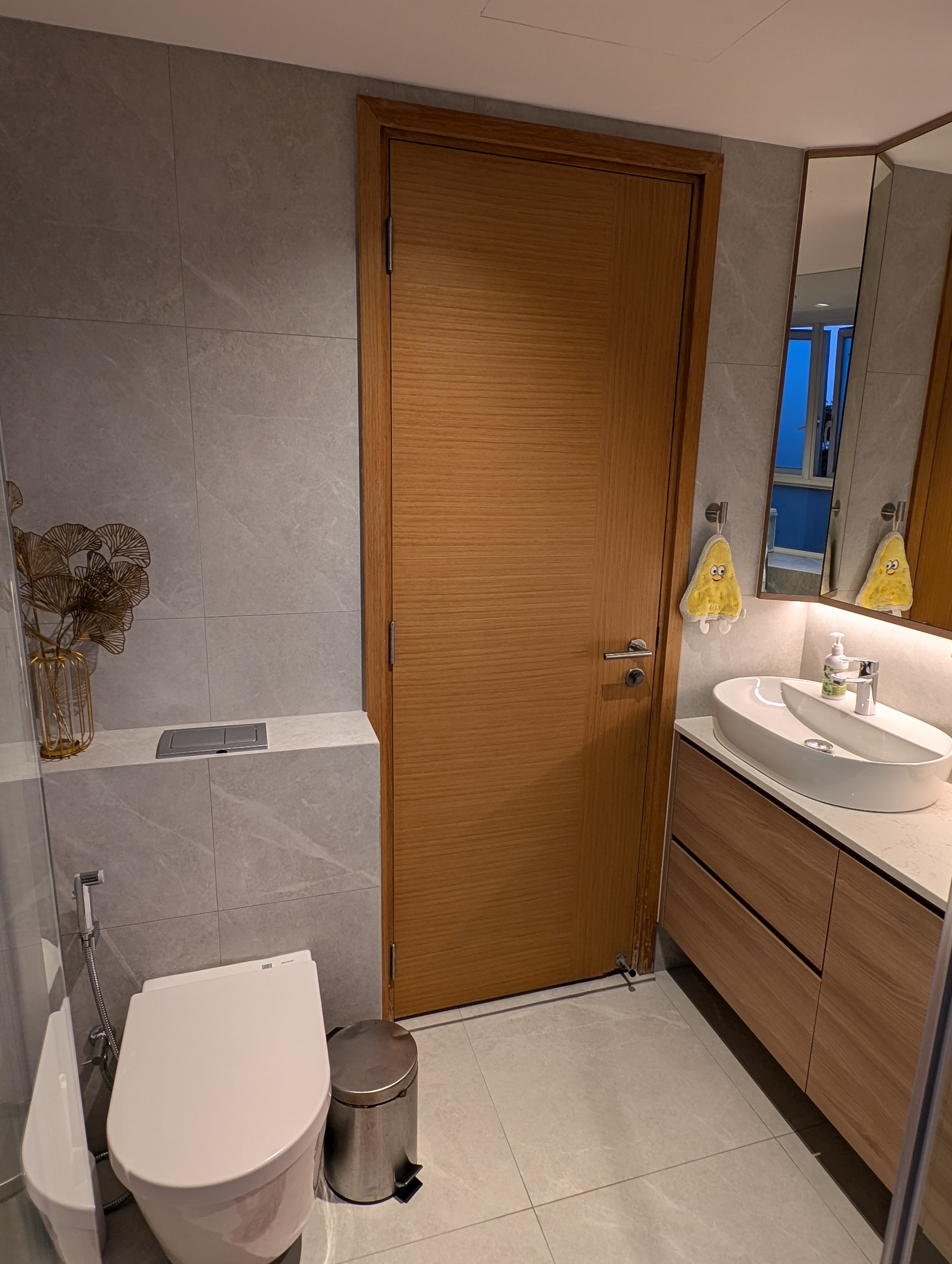 We had a bathtub but dumped it! 🛁 - Modern bathroom interior, sleek design, wooden door, glass shower enclosure, beige