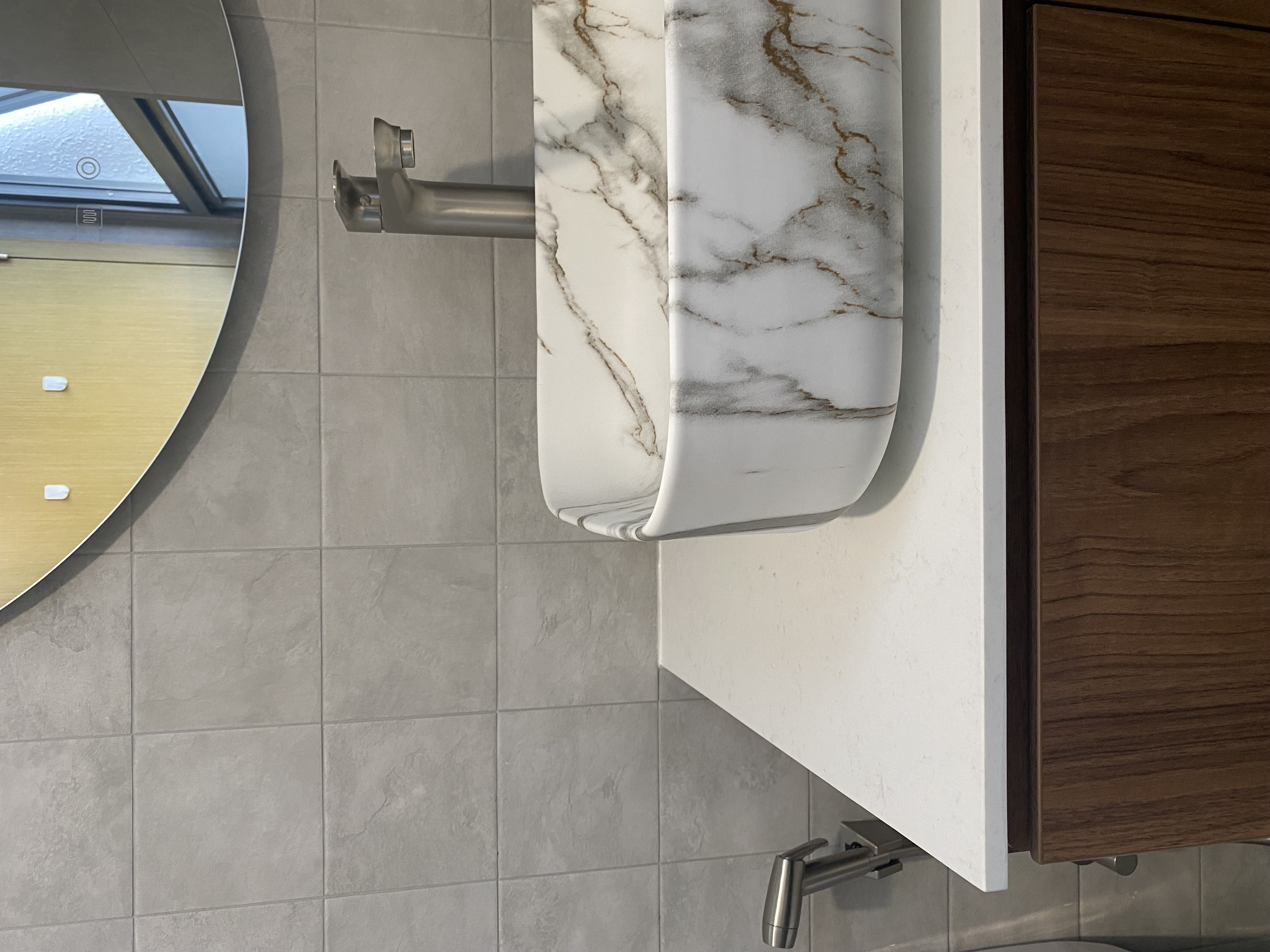 Moody and textured bathrooms in 50 shades of grey - White marble countertop, modern sink, sleek faucet, gray tiled wall