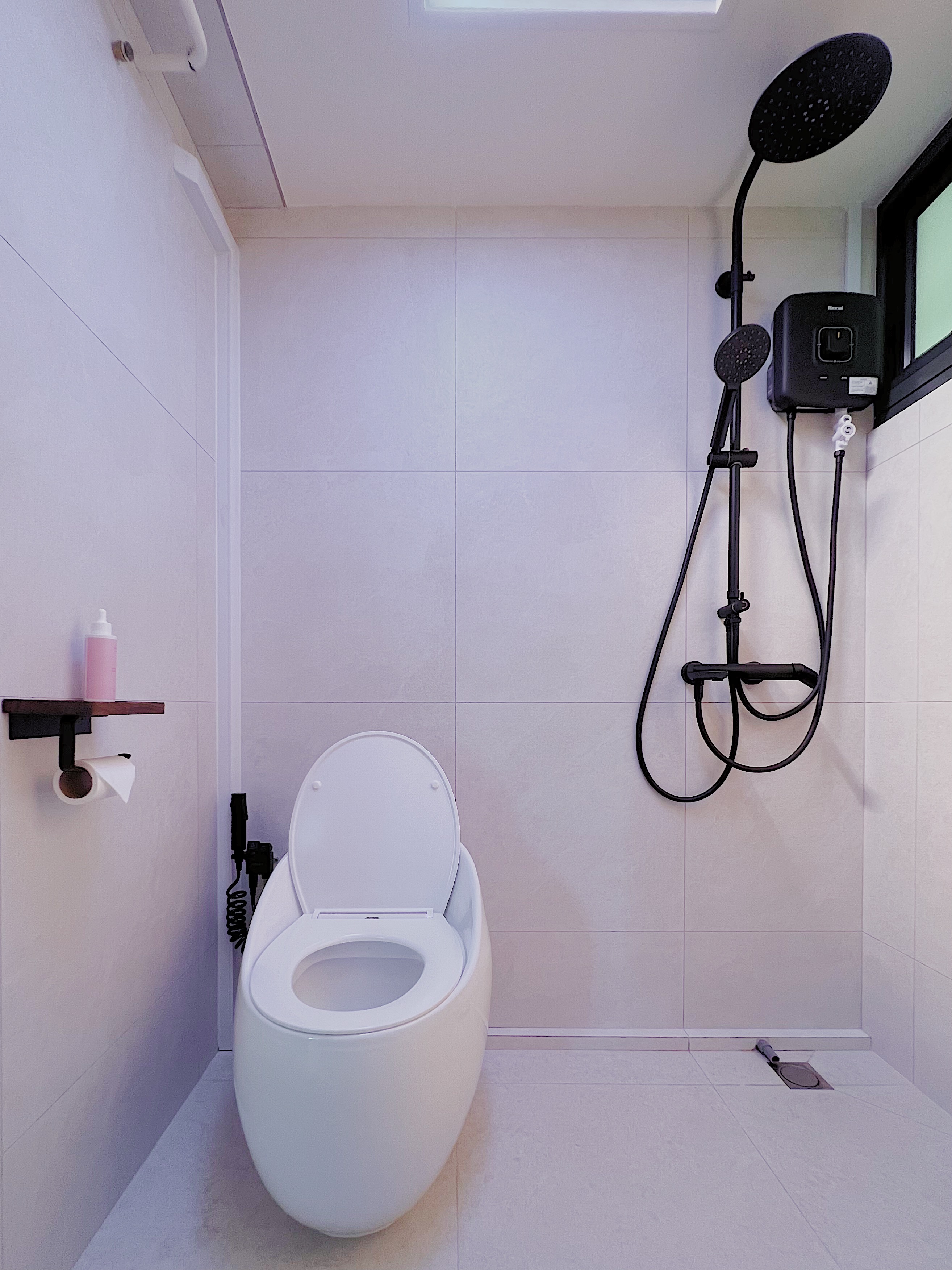 Sunrise or Sunset? Your choice in our Bathroom! - White toilet, modern bathroom, tiled walls, black showerhead, black shower