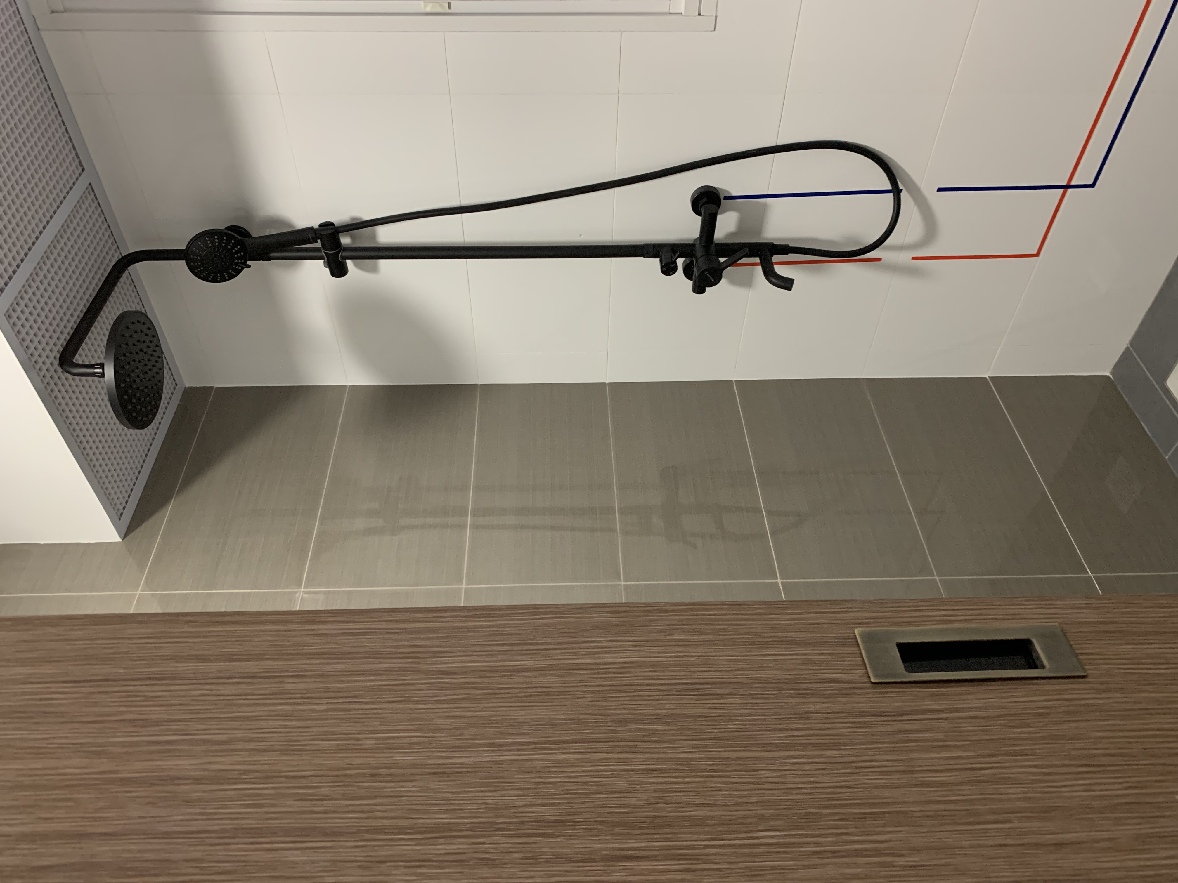 Budget Toilet Renovation Under $1K!! 🛀🏼 - modern bathroom, tiled floor, gray tiles, wooden countertop, black showerhead