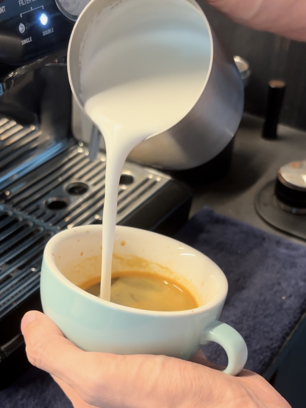 Non-regrets: best home investment decisions!  - coffee machine, espresso machine, pouring milk, milk pouring, milk being