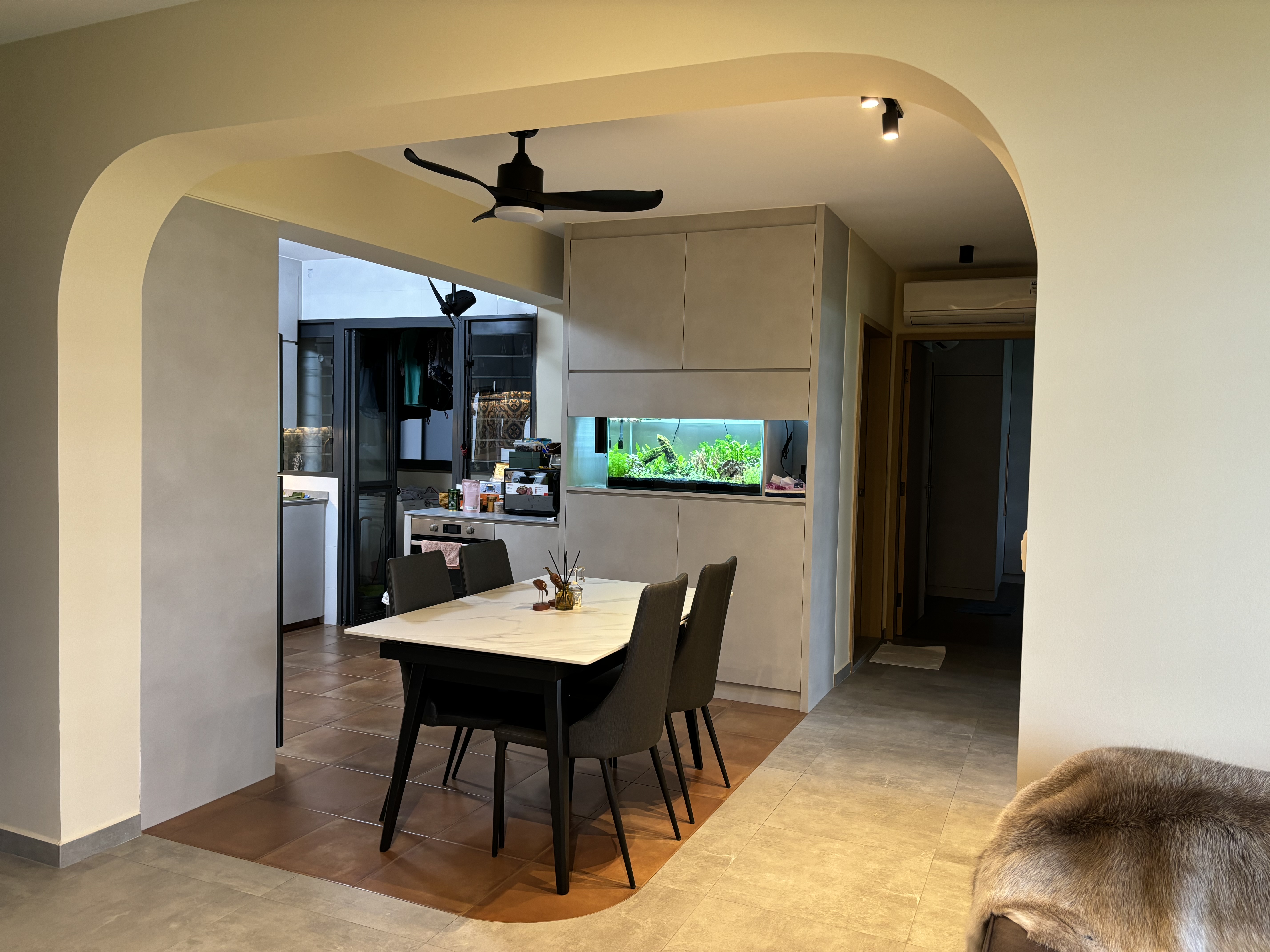 Best of both worlds: 2 differently-styled bathrooms - Modern kitchen with sleek design, beige walls, black ceiling fan