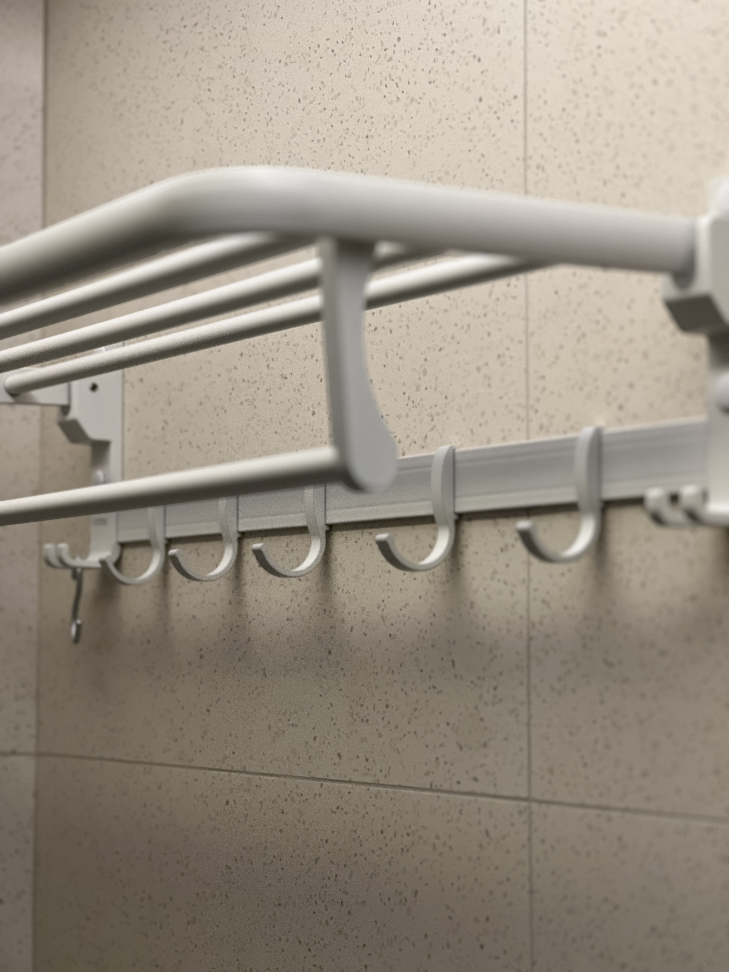 The Bathroom: Everyone’s Throne Room - rack, hanging, hooks, white, metallic, slim, ergonomic, adjustable, functional