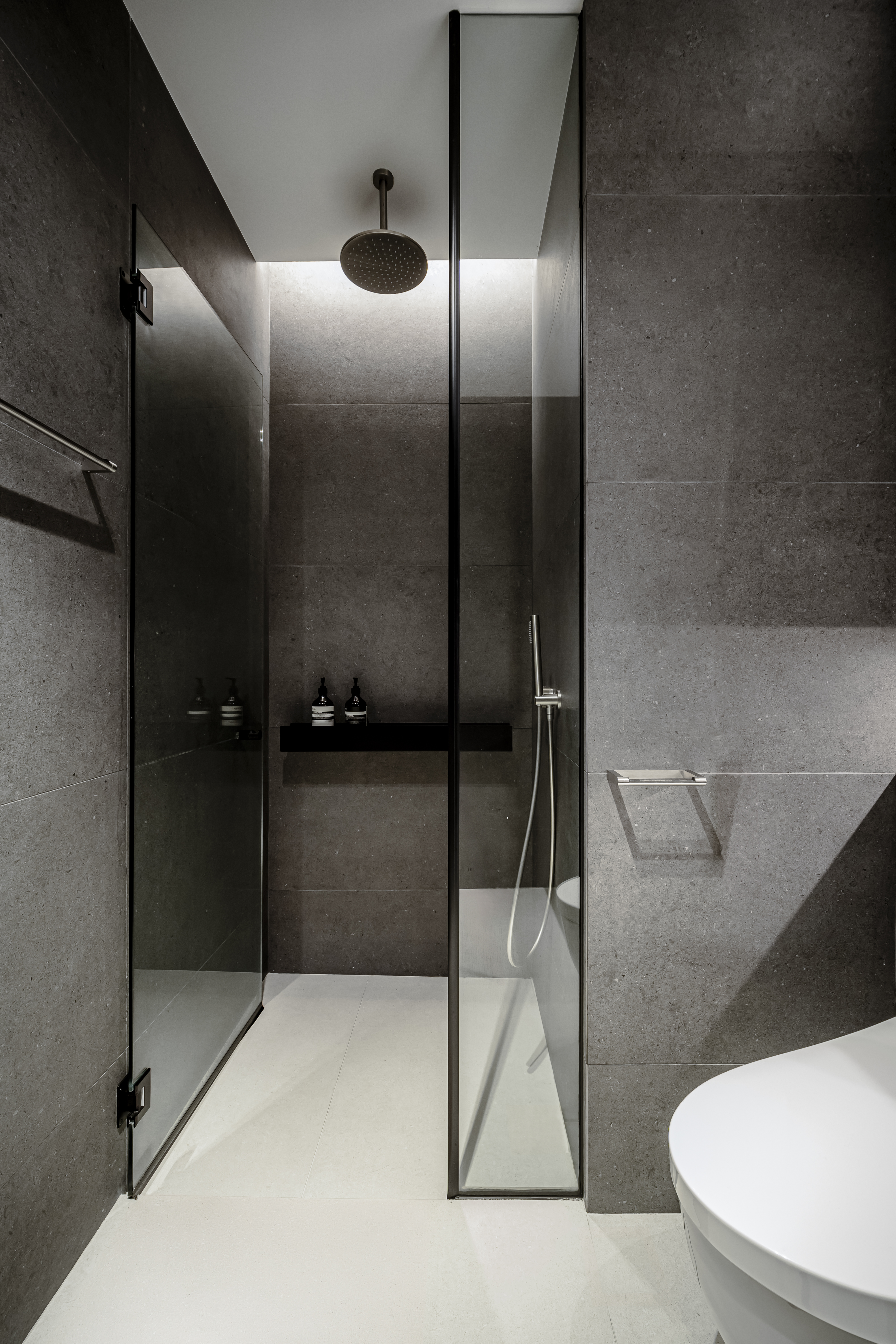 Luxe Loo: Our Bathroom Glow-Up (And We Hacked Down One Shower!) - Modern minimalist bathroom, sleek design, dark gray tiles