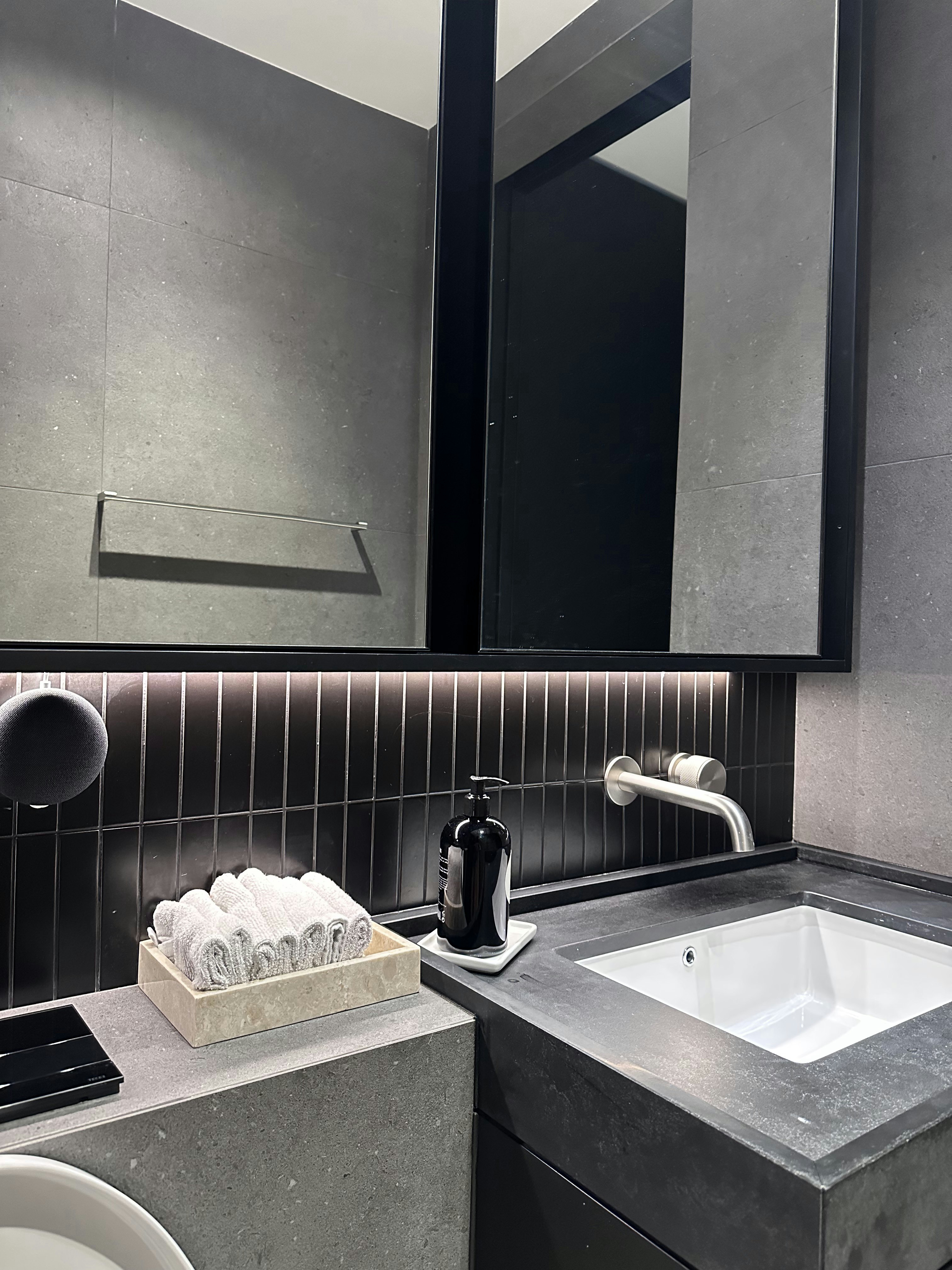 Luxe Loo: Our Bathroom Glow-Up (And We Hacked Down One Shower!) - Modern bathroom vanity, sleek design, dark gray tiles