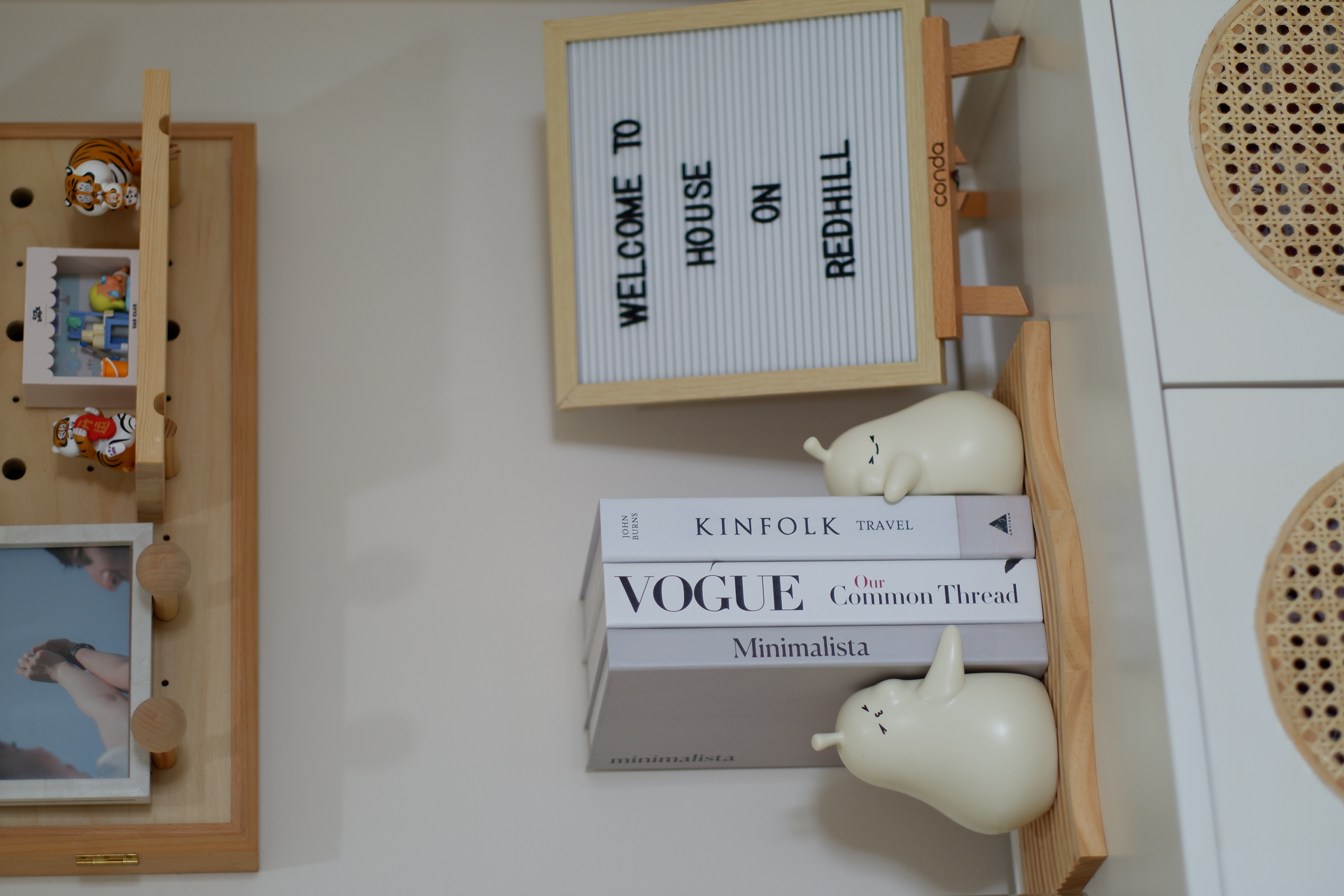 Our Entryway: How we concealed our DB box with a cheap hack!  - Wooden shelf, small figurines, "Welcome to House on Redhill"