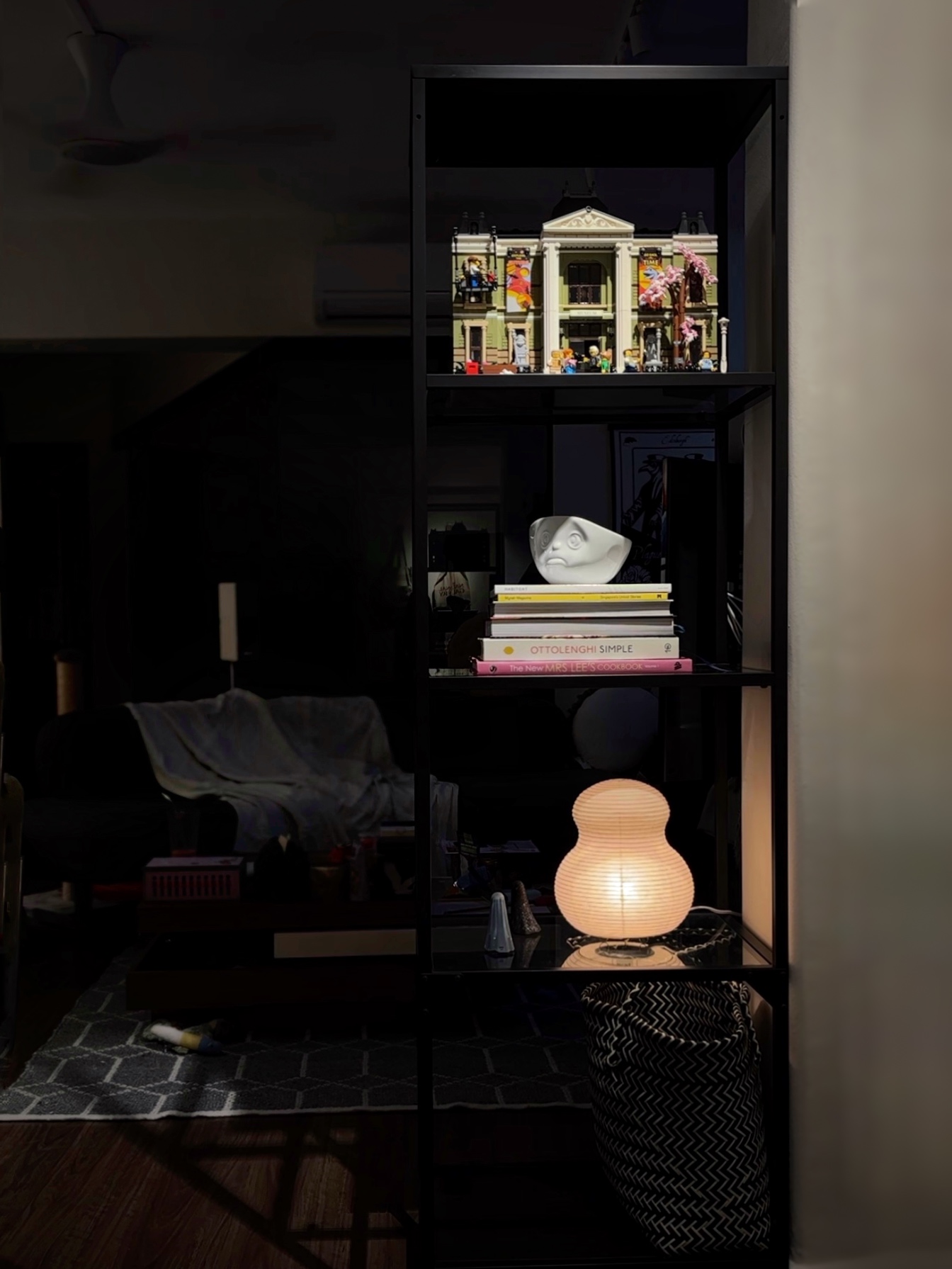 6 types of Ambient Lights for Cosy Vibes  - dimly lit room, cozy corner, black shelving unit, abstract art, cityscape photo