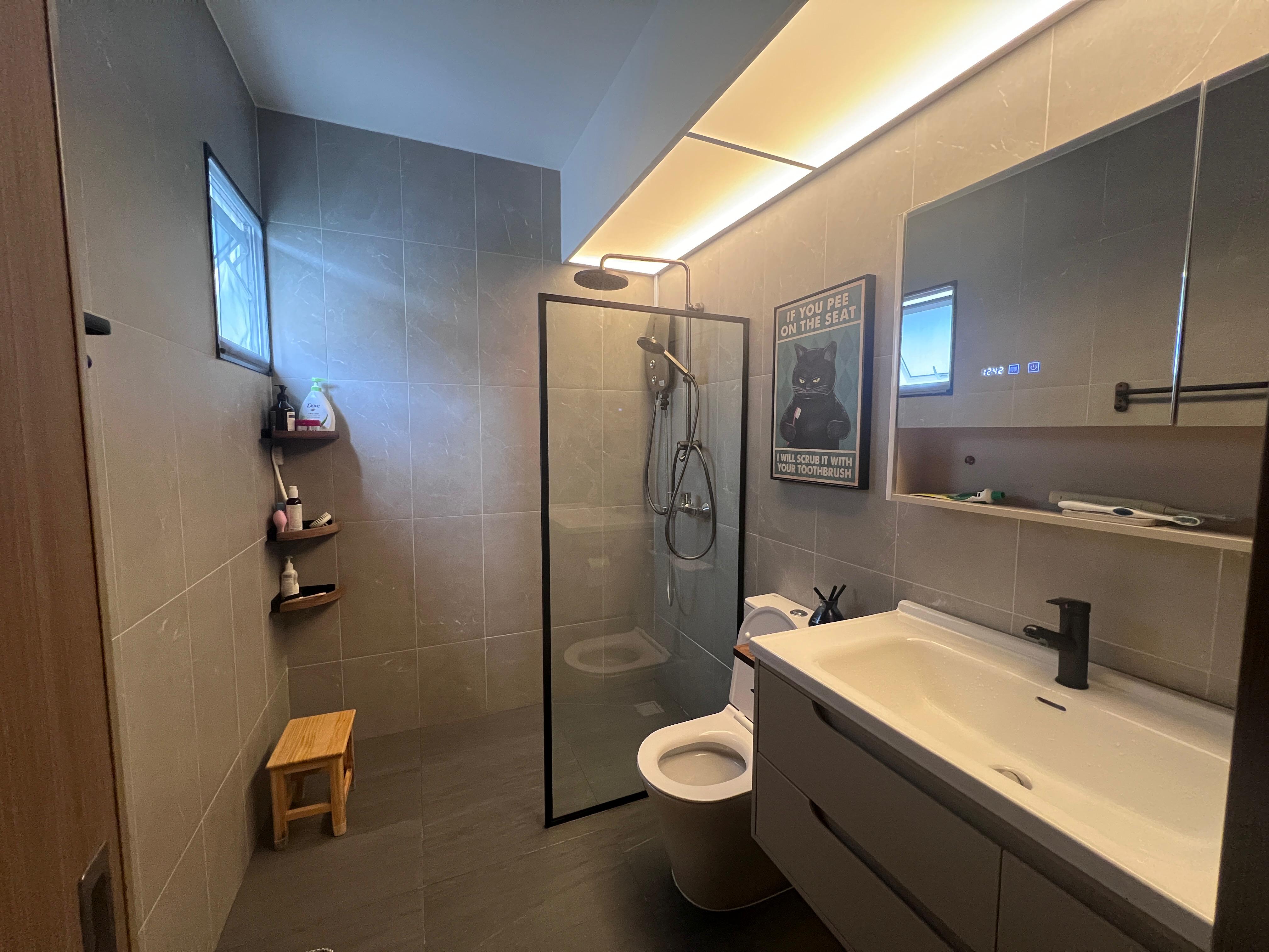 Simple and cost saving toilet - Modern bathroom with sleek design, gray tiles, minimalist decor, glass shower enclosure