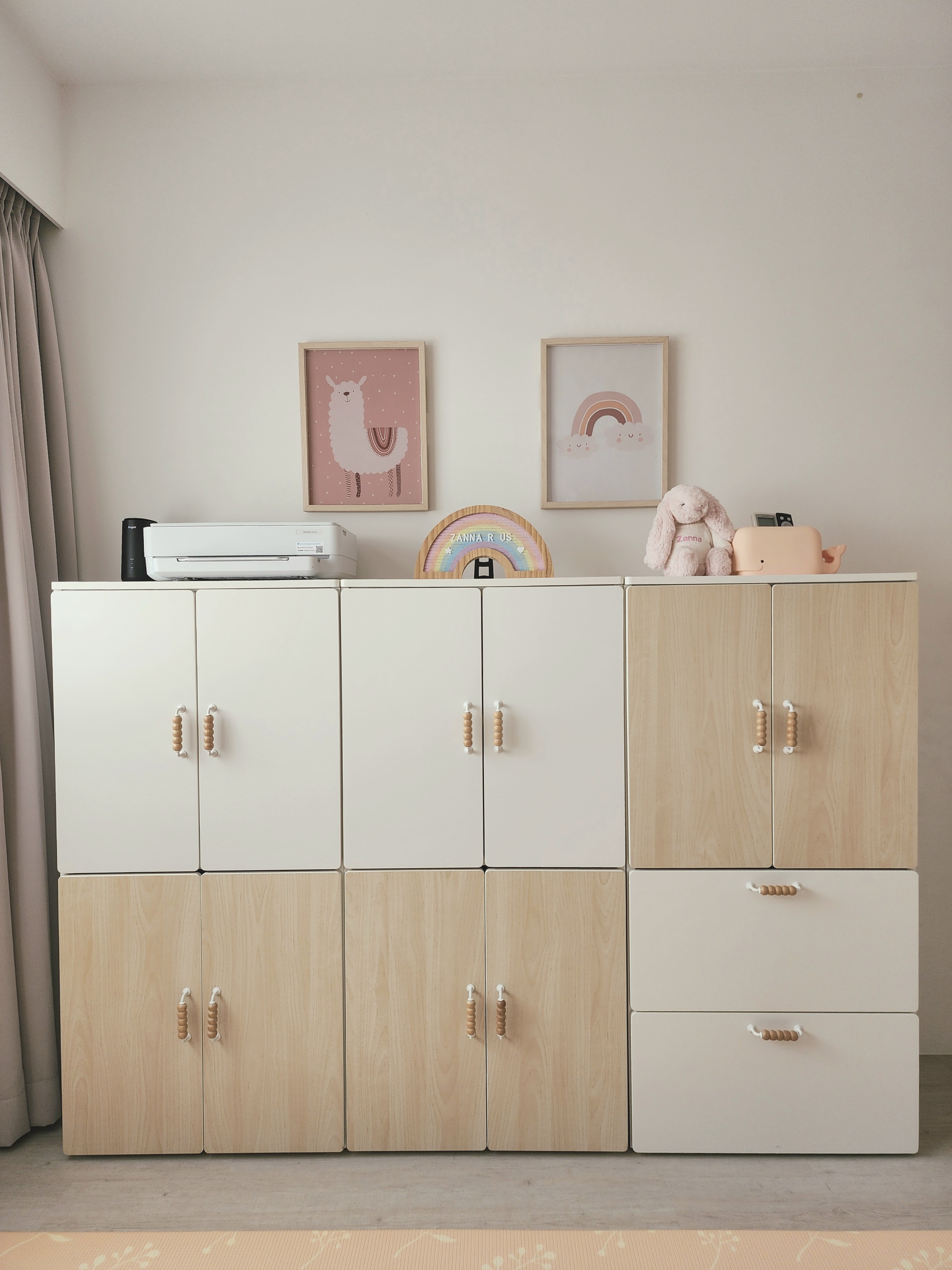 Our Kids Playroom: Where Fun Never Ends - Wooden cabinet, minimalist design, light beige color, wooden handles, white