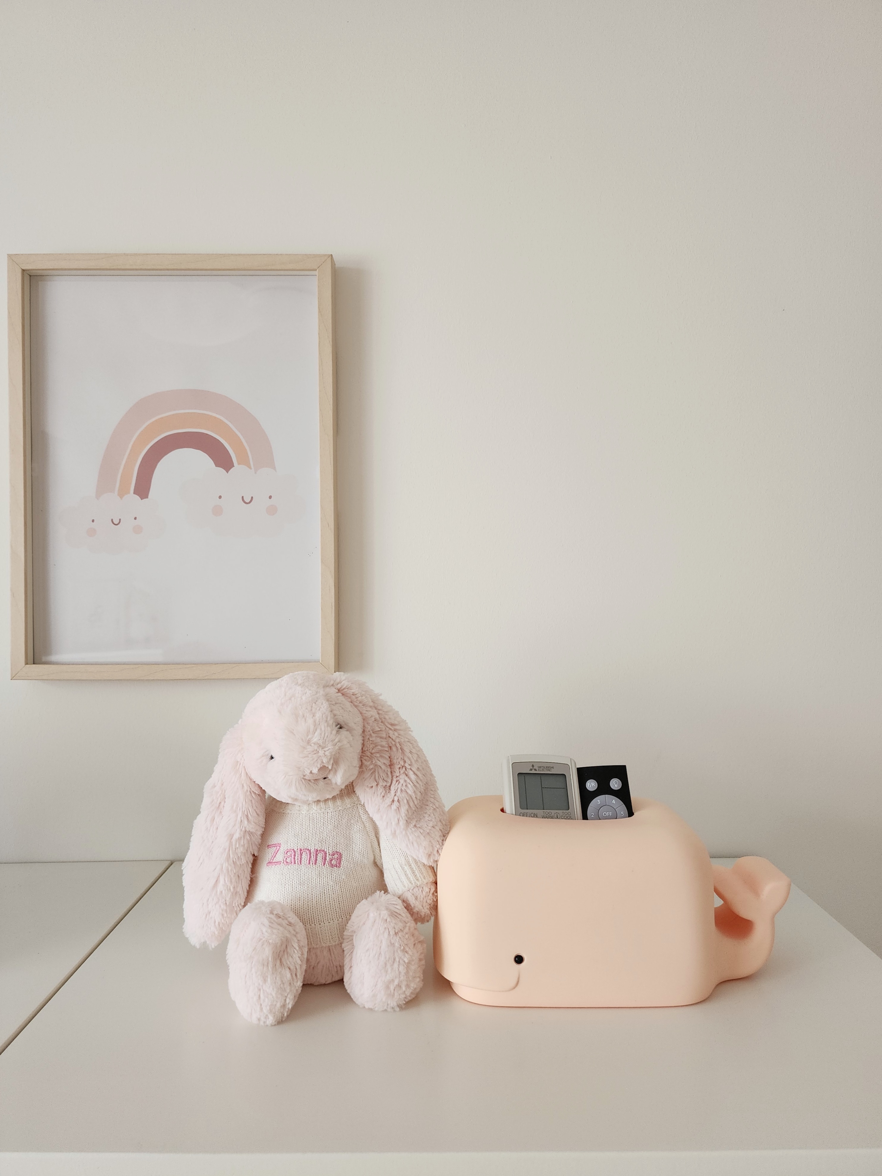Our Kids Playroom: Where Fun Never Ends - Soft pink stuffed bunny named "Zanna" sits on a white surface next to a cute