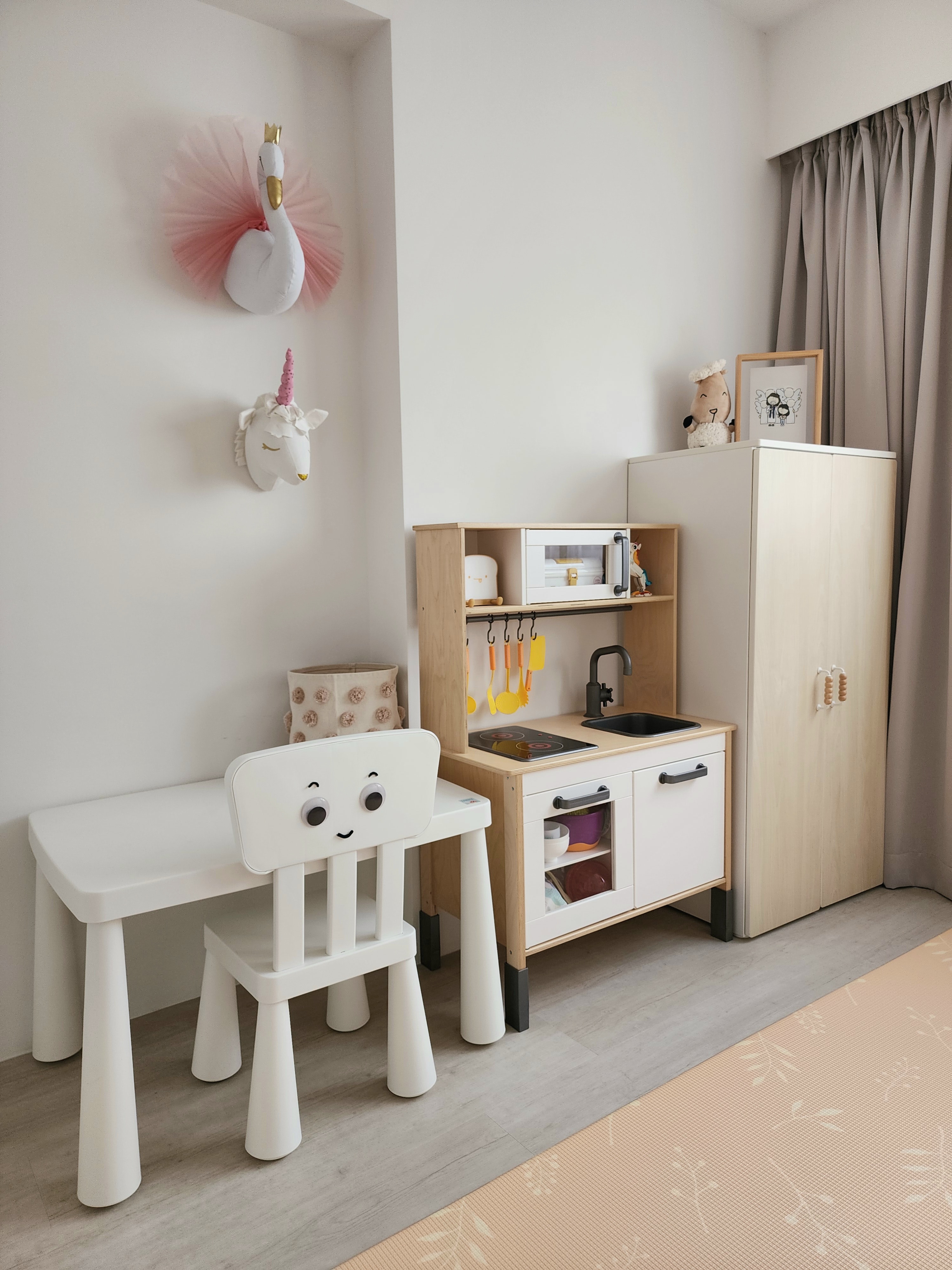 Our Kids Playroom: Where Fun Never Ends - Children's play kitchen with cute, smiling chairs, wooden cabinets, white