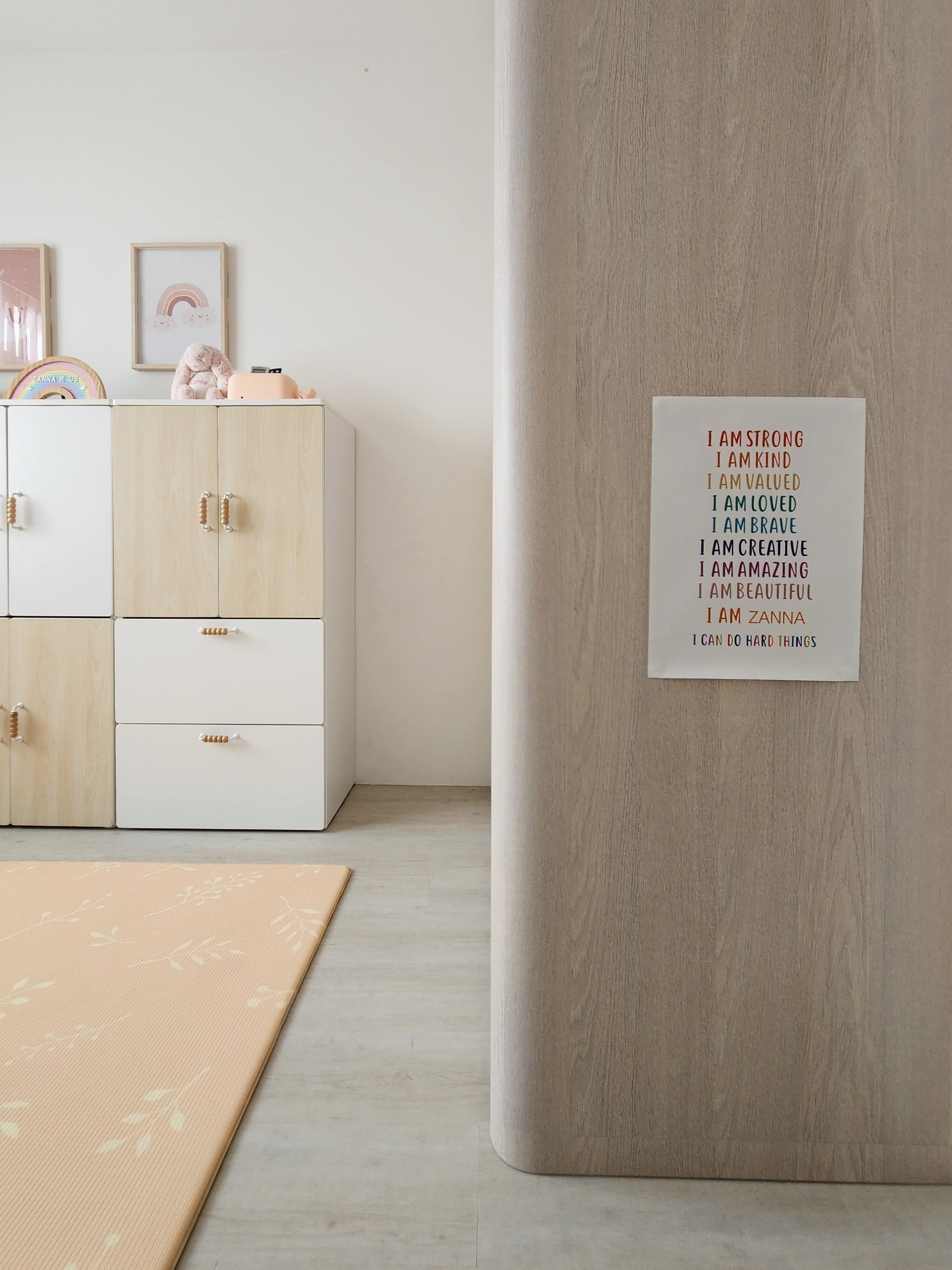 Our Kids Playroom: Where Fun Never Ends - Wooden cabinet, minimalist design, pastel colors, light wood finish, soft lighting