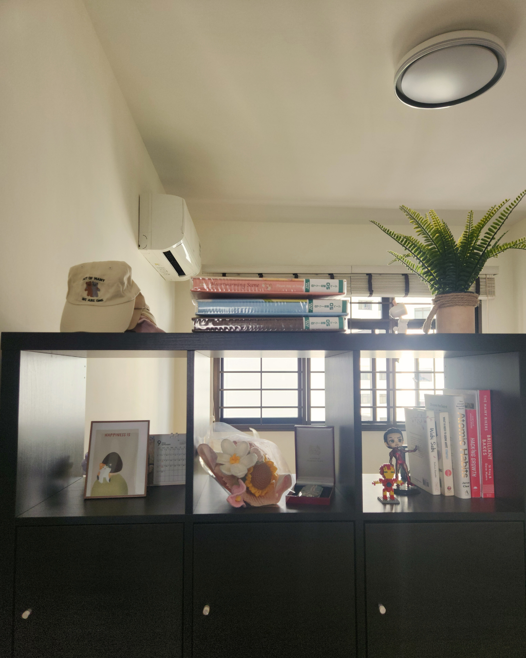 Personal Touches: Bringing Warmth to Our Guest Room - ceiling light fixture, beige hat, white wall, air conditioning unit