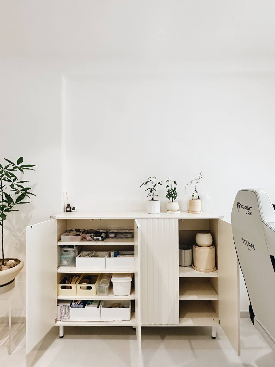 Our Home Office: An arch in our wall (Semi-open concept room) - White minimalist desk, potted plants, organized storage