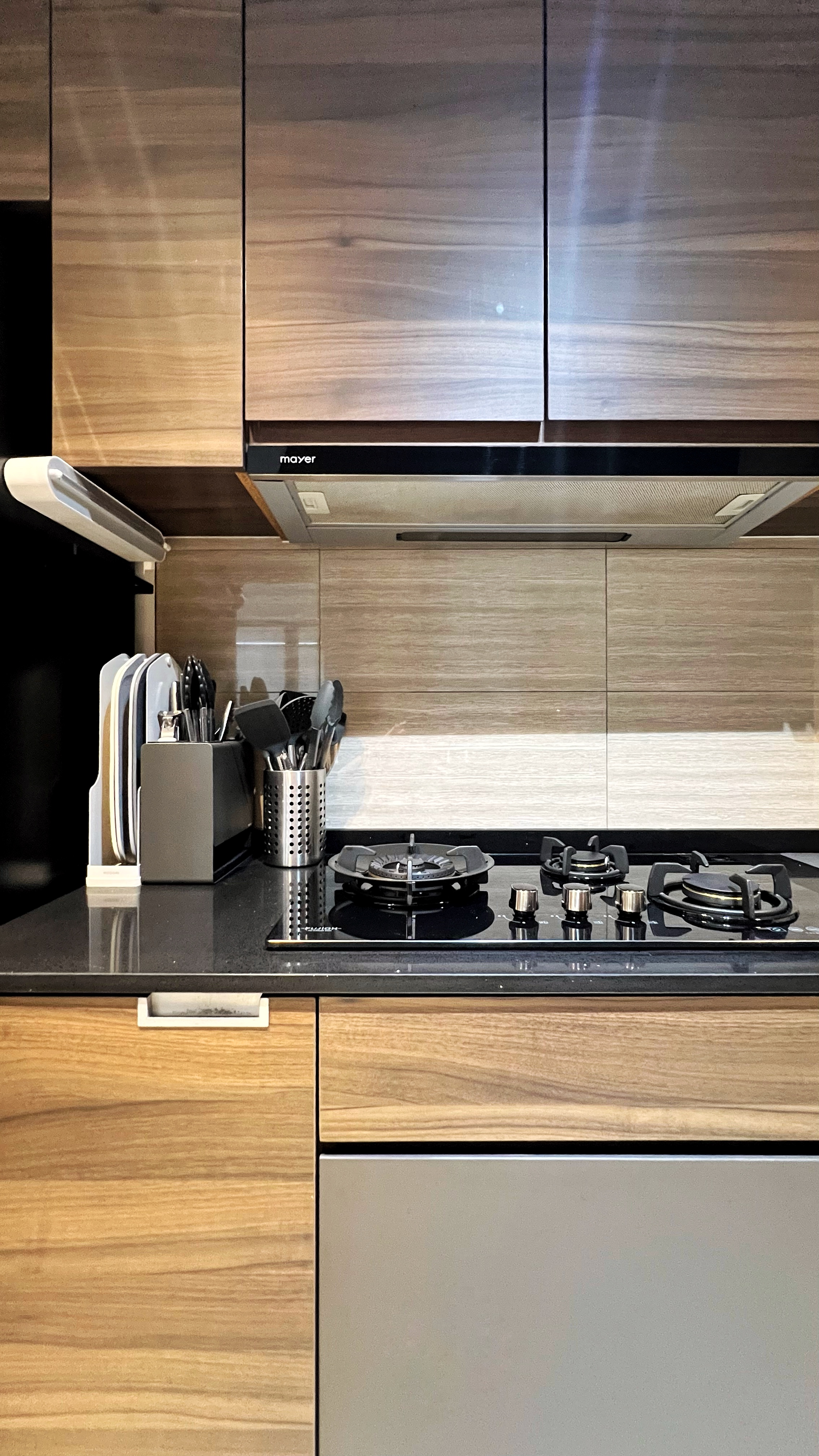 Cooking is an Adventure and This is My Launchpad! - Wooden kitchen cabinets, modern stove, black cooktop, stainless steel