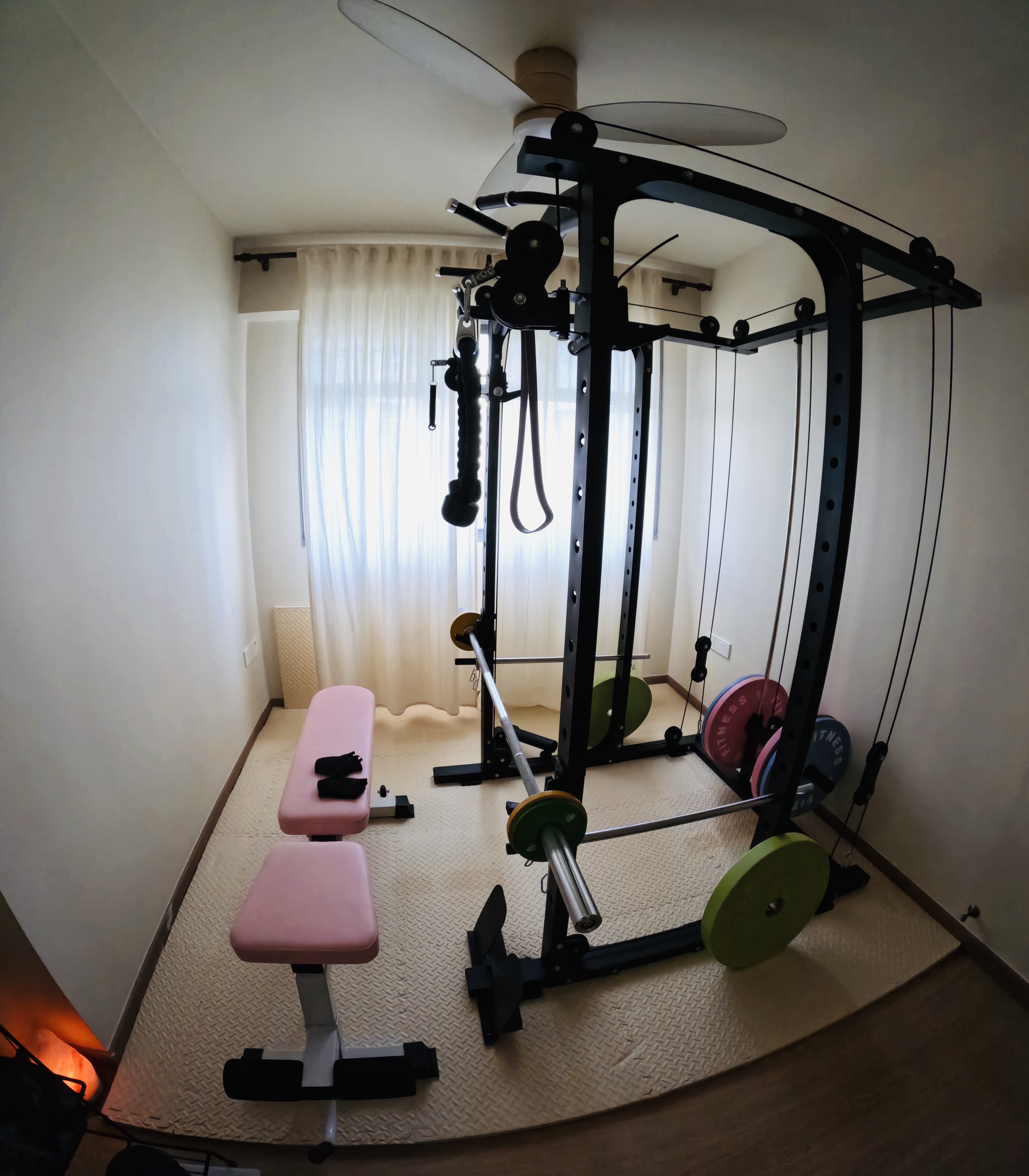 Under $1000 Home Gym: Versatile Gym Setup with Fun Colours! - Fitness room, black exercise equipment, weightlifting station