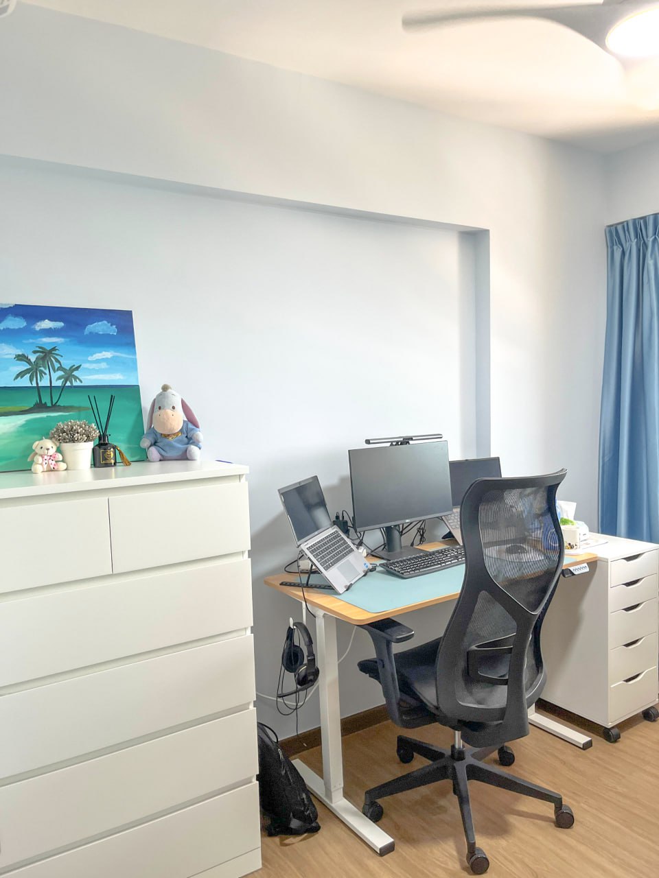 Home Office: White vs Black - white office space, modern desk setup, ergonomic chair, computer monitors, laptop, blue