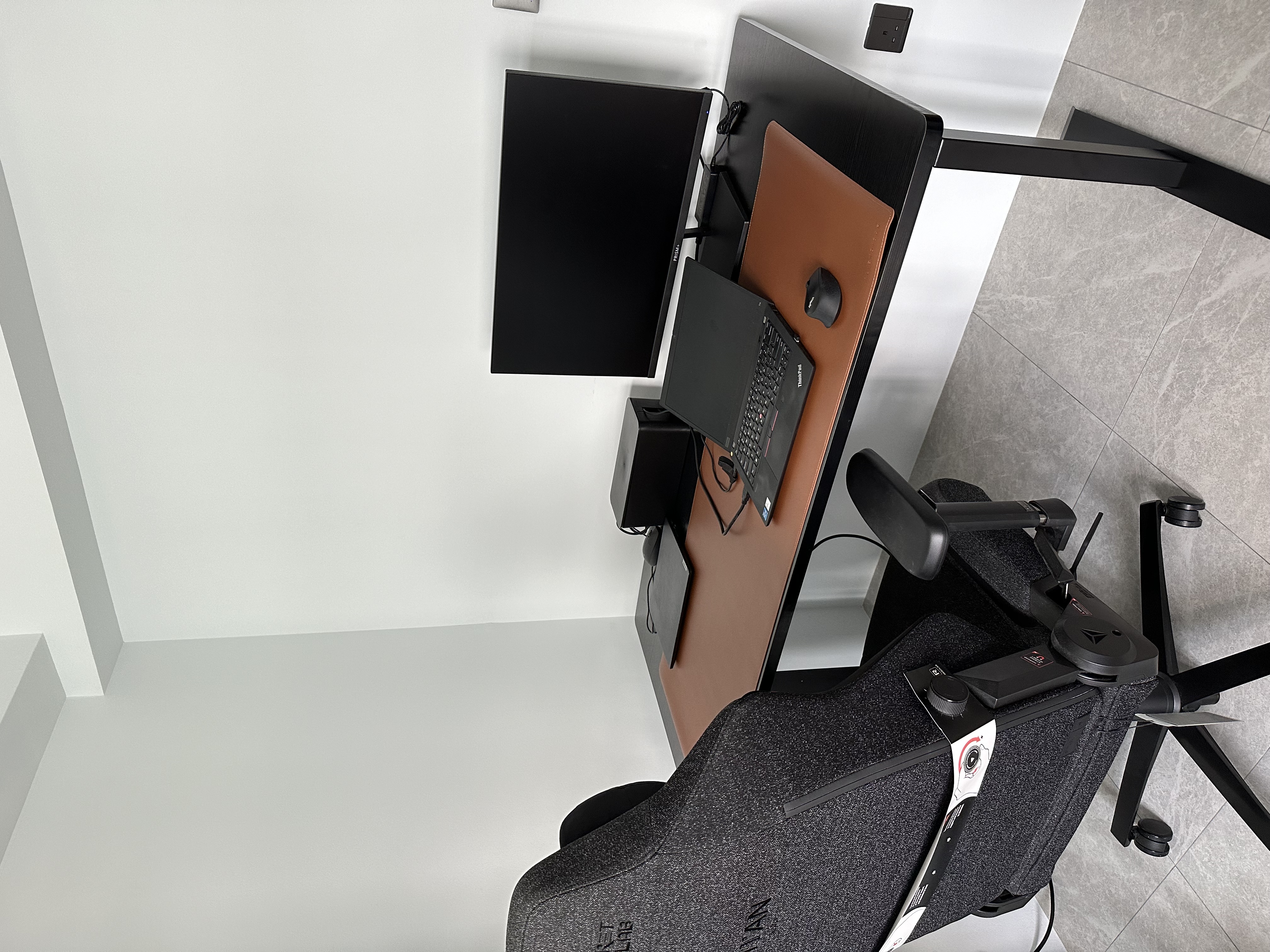 Ergonomic Home Office Setup! - Modern workspace, ergonomic chair, black and brown desk, sleek monitor, wireless mouse