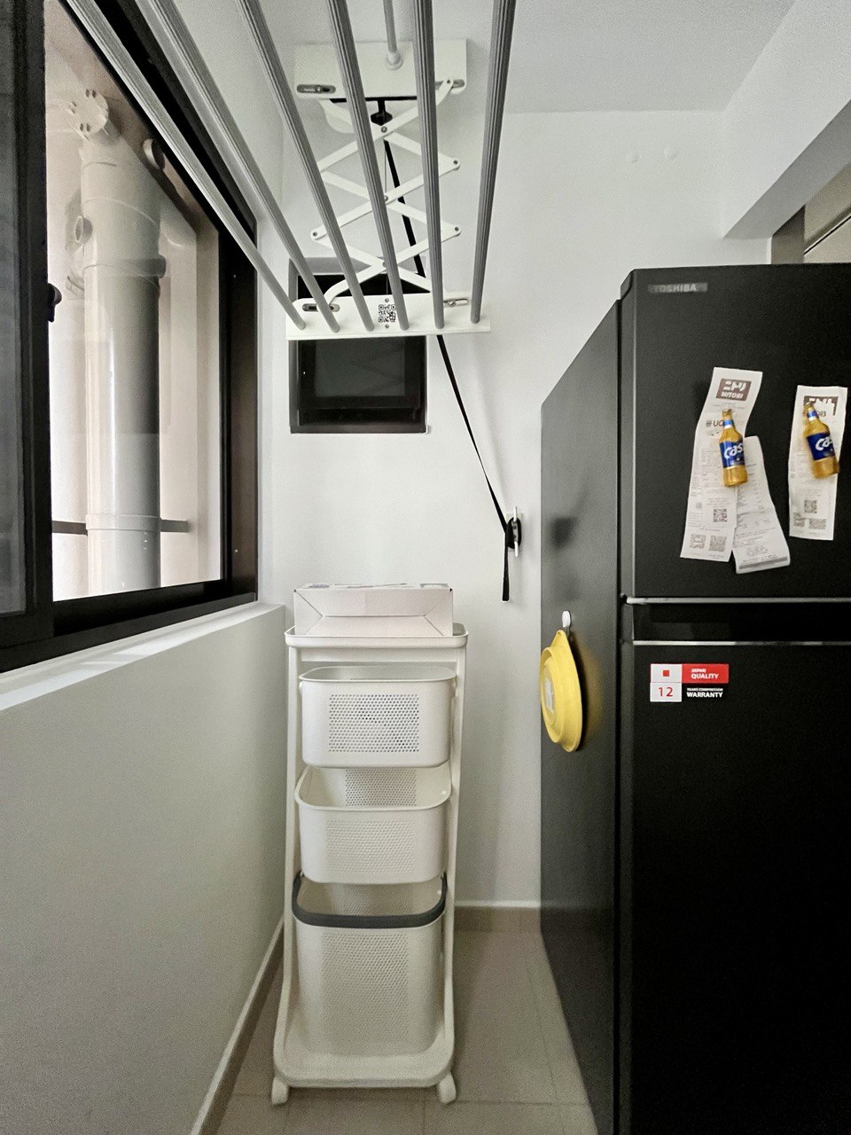 Carpentry-Free-Service-Yard-with-a-Fridge-in-a-3-Room-BTO