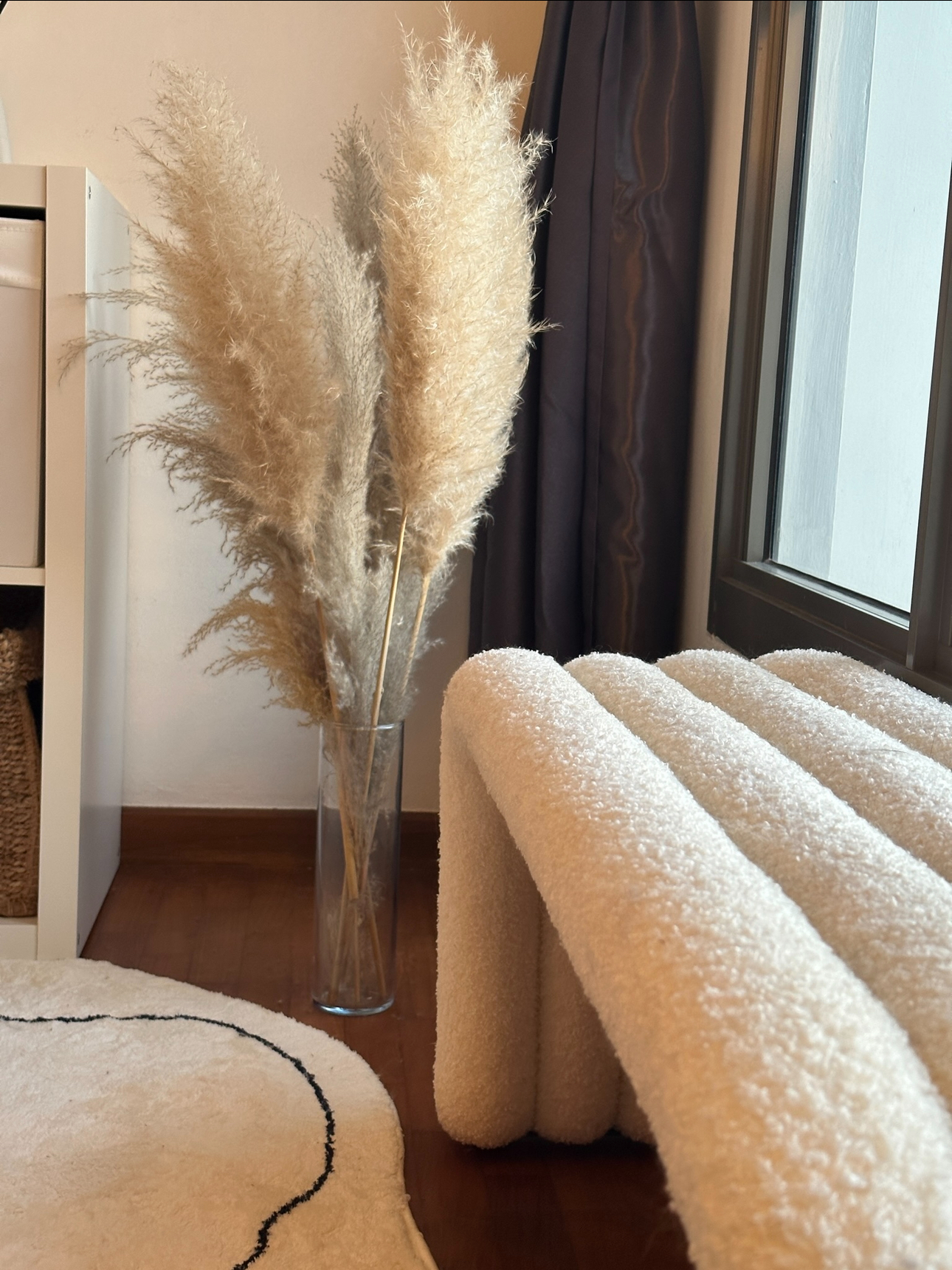 Our Studio Office: Where Our Work Takes Place, Literally 📸📽️🎞️ - Faux fur plant, beige curtains, wooden floor, white rug