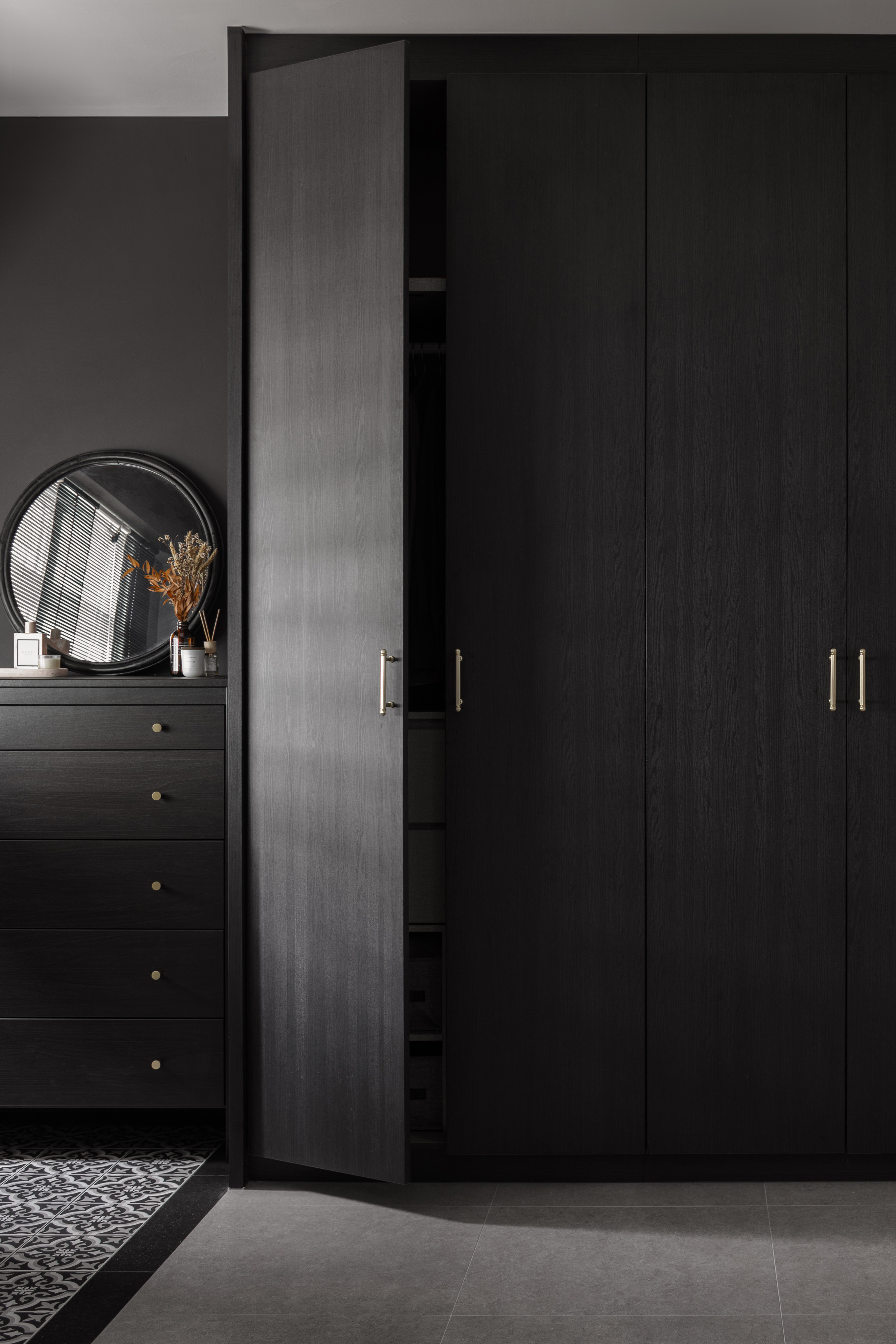 Simple home organisation tips you can try! - Dark wooden wardrobe, minimalist design, sleek finish, modern aesthetic
