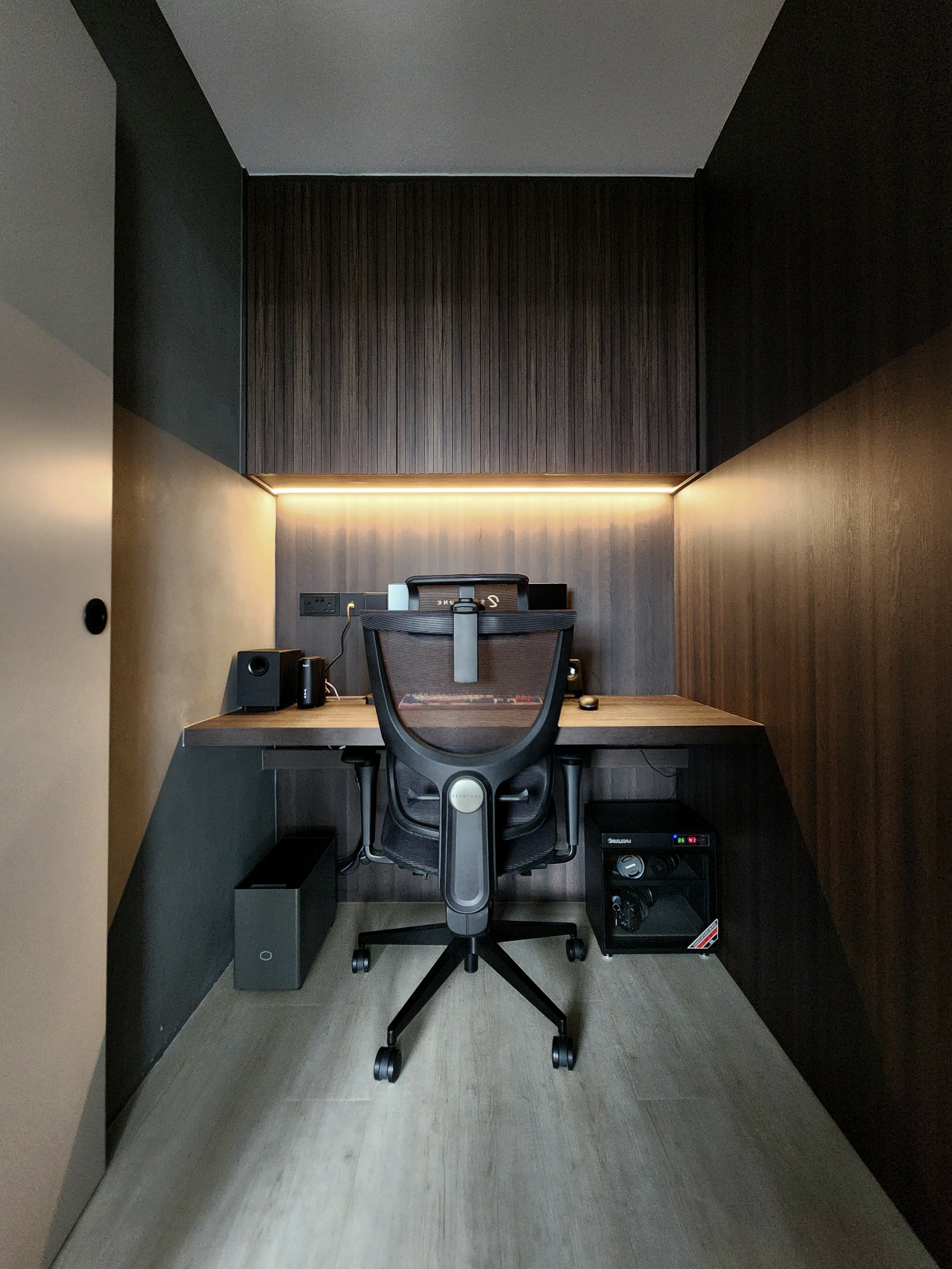 Our Closet Office: Small Space Big Impact - Modern workspace, sleek desk, ergonomic chair, minimalist design, dark wood