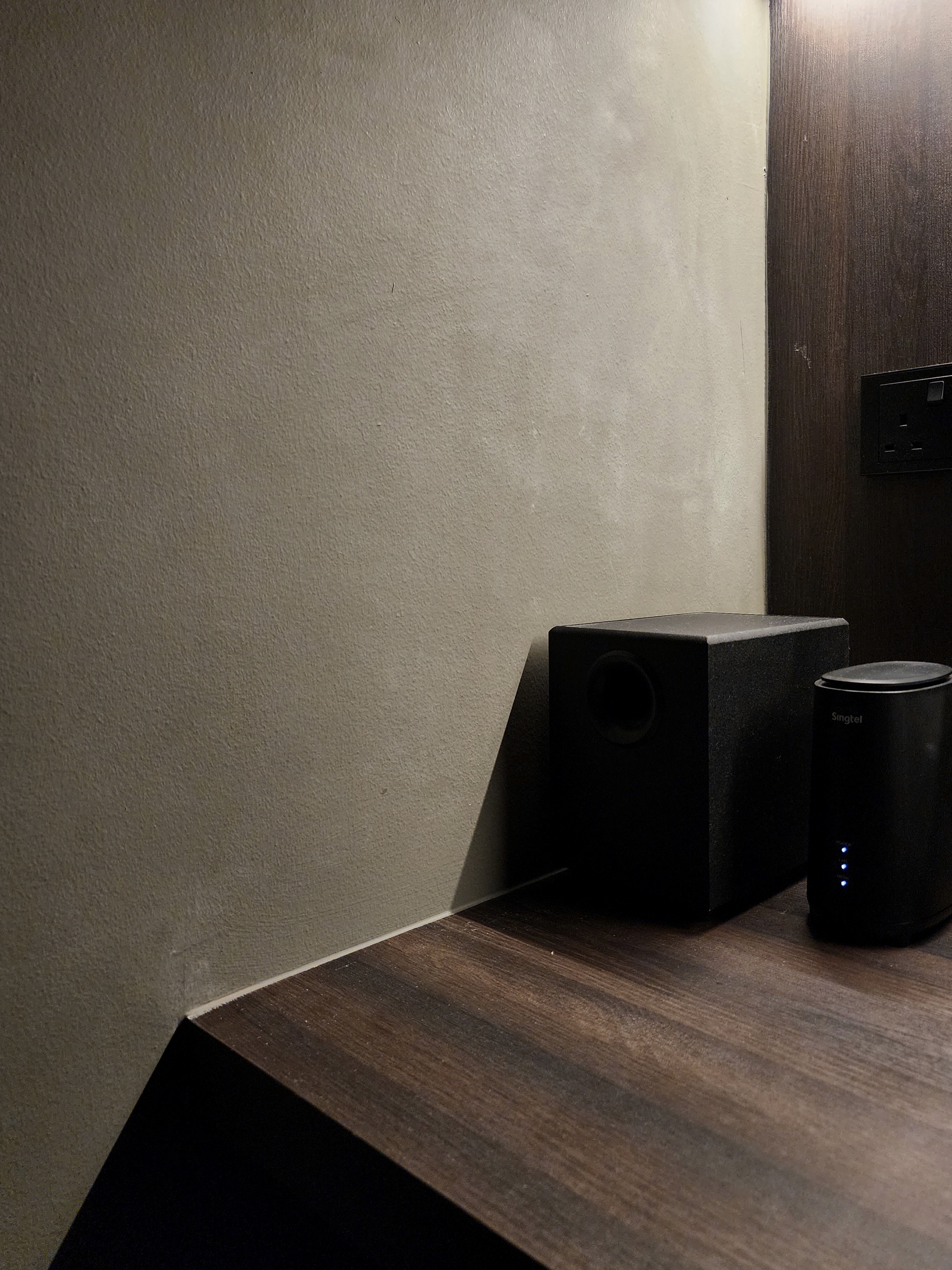 Our Closet Office: Small Space Big Impact - Sound system, black speakers, minimalist room, wooden surface, sleek design